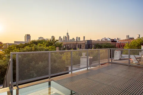 a kitchen with granite countertop a sink and cabinets