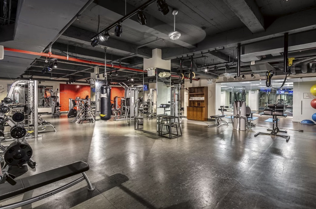 88 Greenwich Street, Unit 3003 Manhattan, NY 10006 - Photo 11 of 19 a view of a room with gym equipment