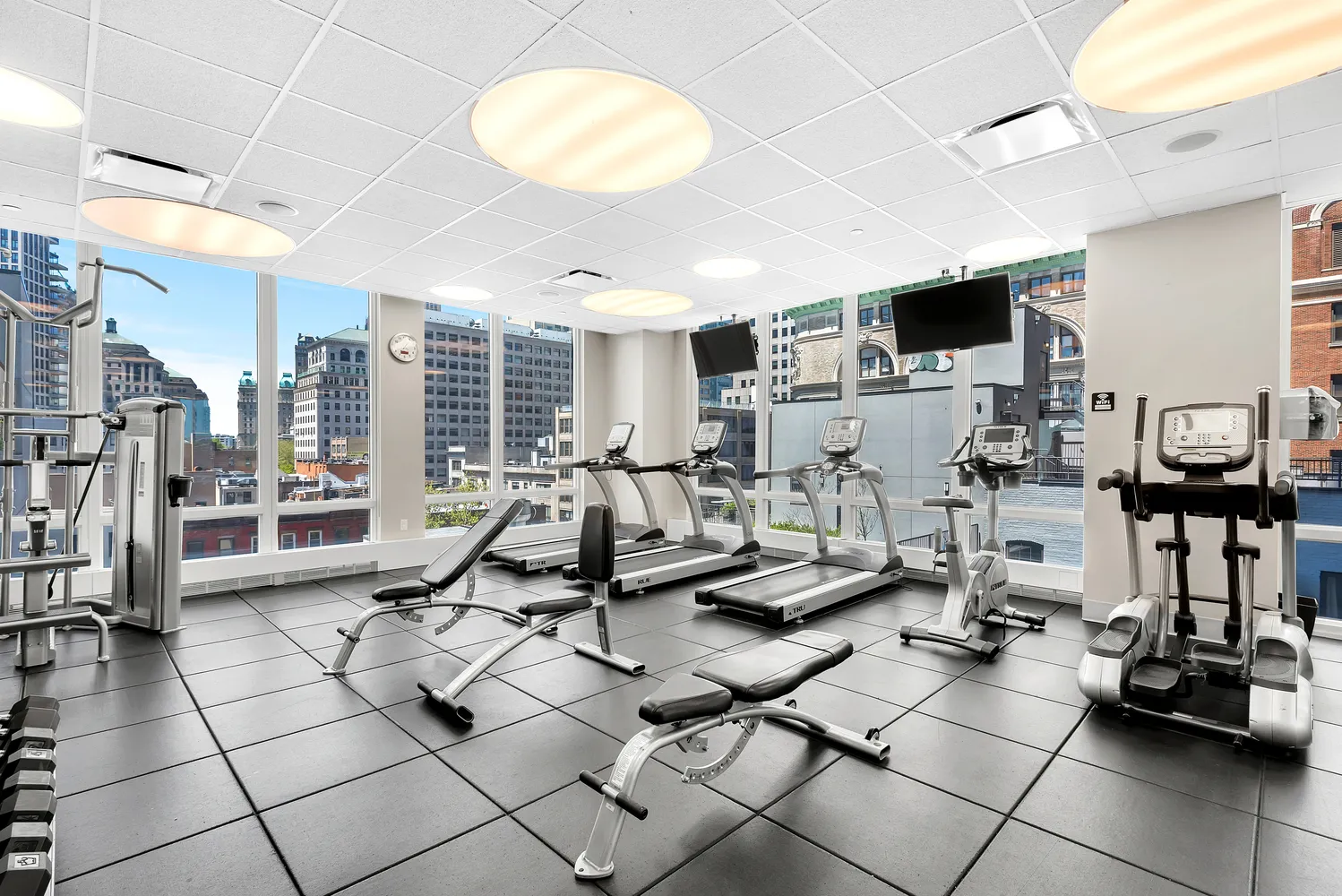 a living room with lots of furniture and a flat screen tv