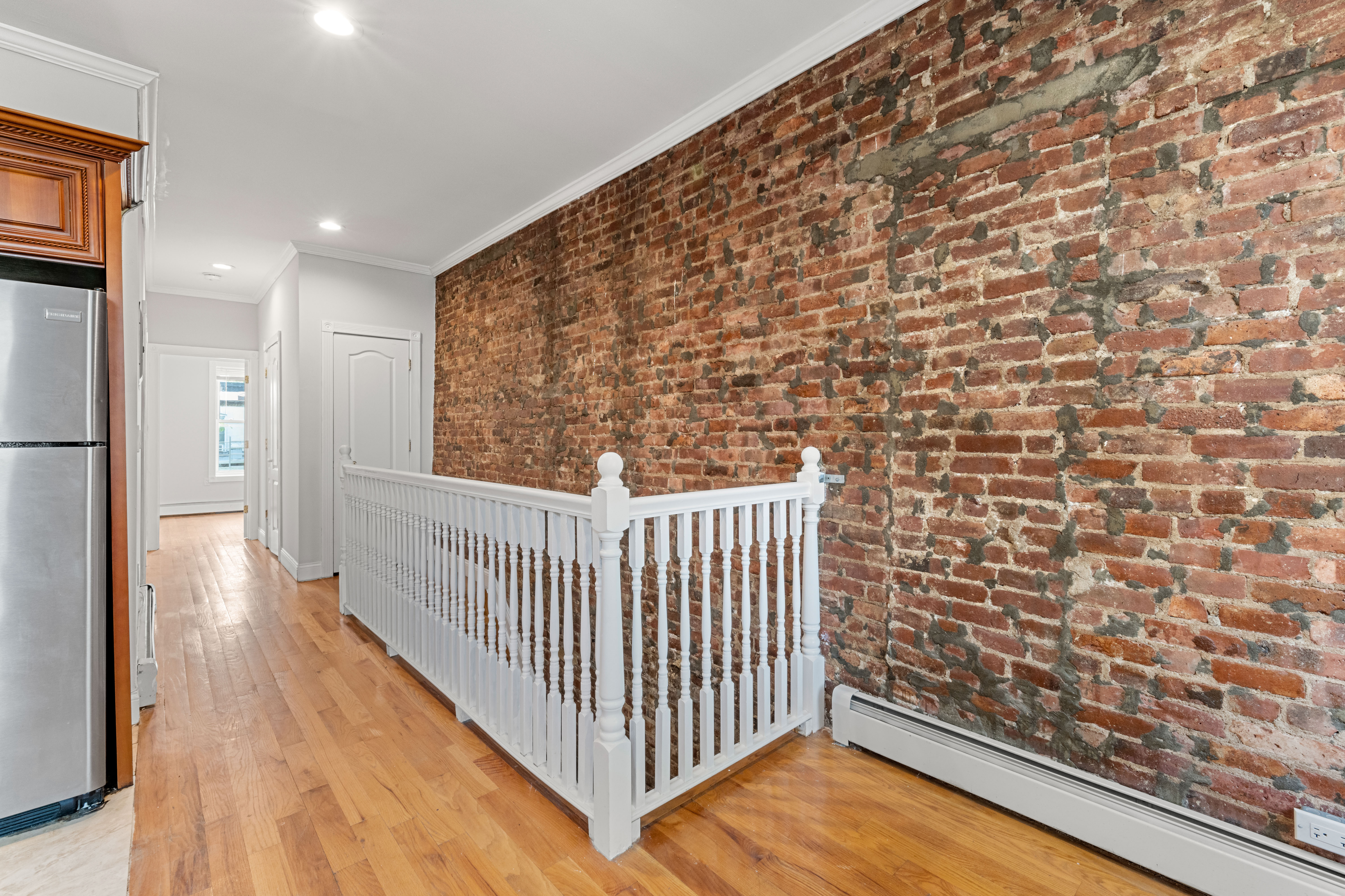 397 Bainbridge Street Brooklyn, NY 11233 - Photo 5 of 12 a view of a hallway