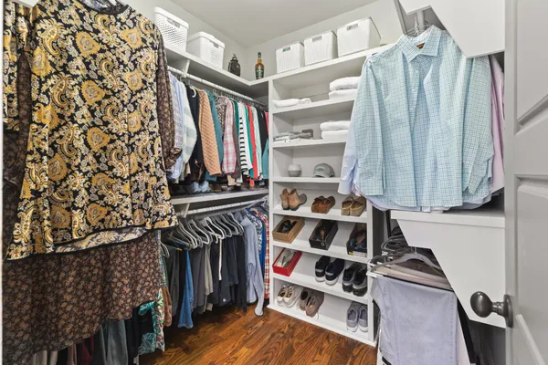 a view of an entryway with wooden floor