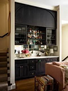a kitchen with a sink and cabinets