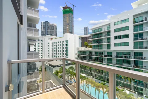 a view of a balcony with city view