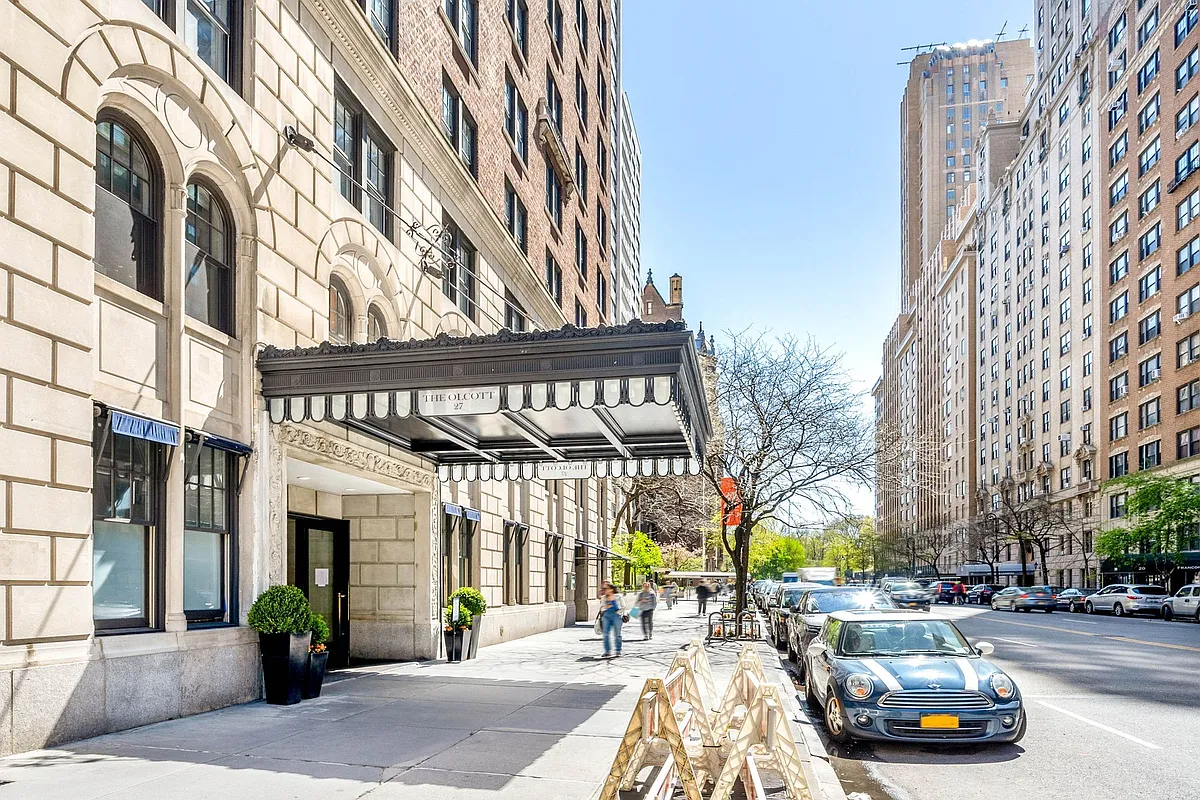 27 West 72nd Street, Unit 1403 Manhattan, NY 10023 - Photo 14 of 16 a car parked in front of a building