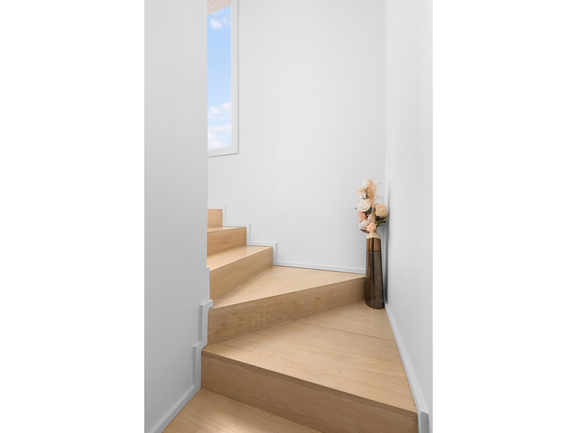 800 Dean Street, Unit PH Brooklyn, NY 11238 - Photo 3 of 11 a view of a hallway with toilet