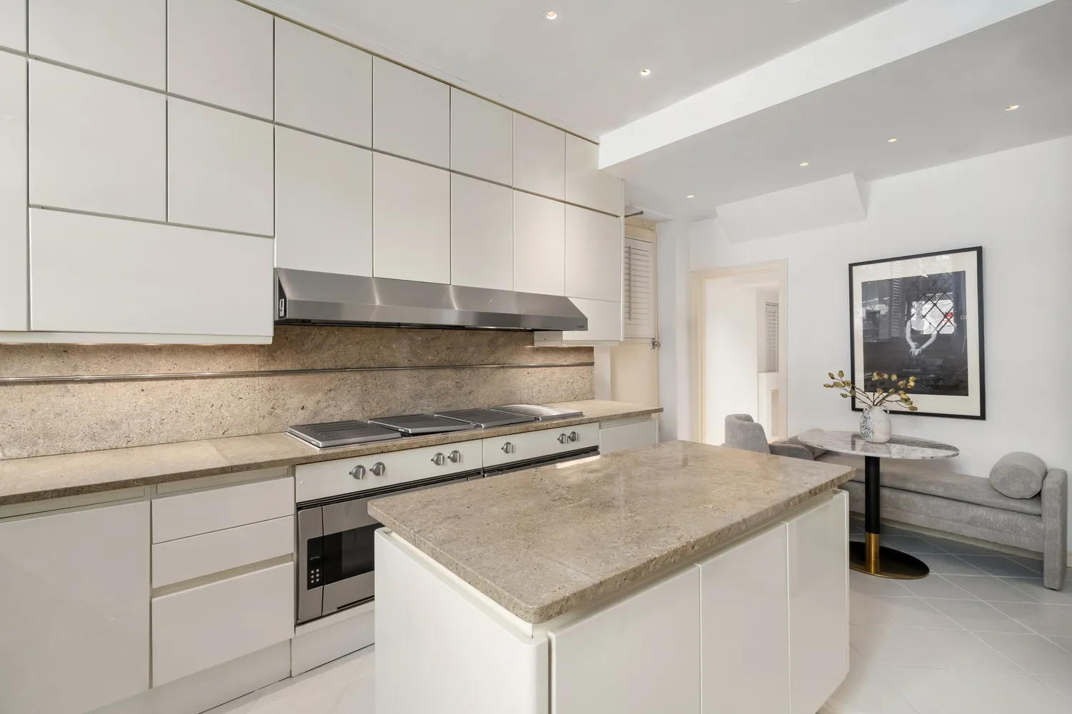 a view of a room with kitchen area and appliances