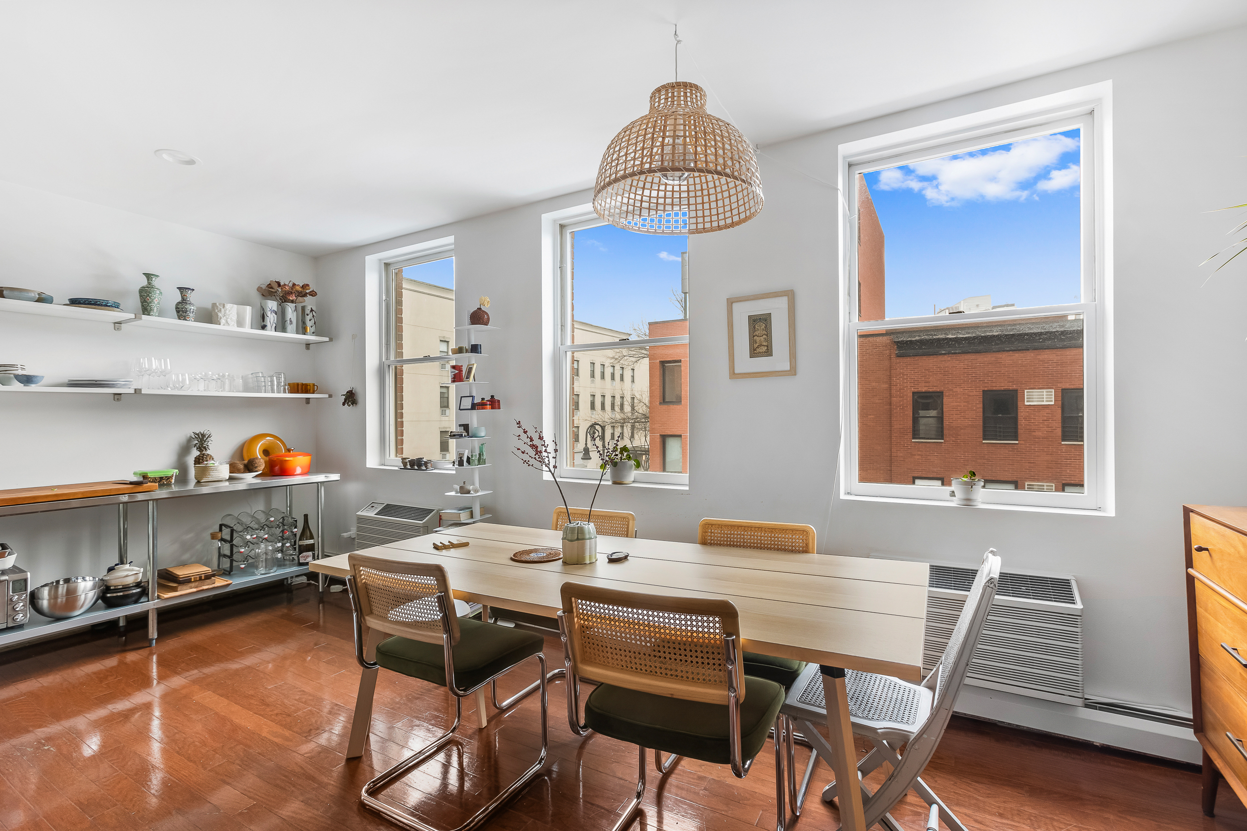 185 Smith Street Brooklyn, NY 11201 - Photo 7 of 14 a dining room with wooden floor and breakfast area