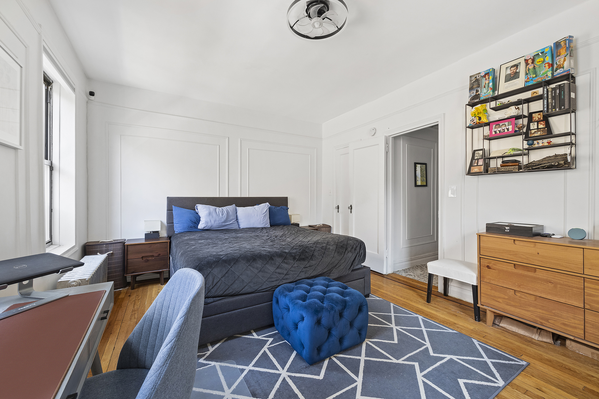 225 Bennett Avenue, Unit 5H Manhattan, NY 10040 - Photo 4 of 10 a bedroom with furniture and a window