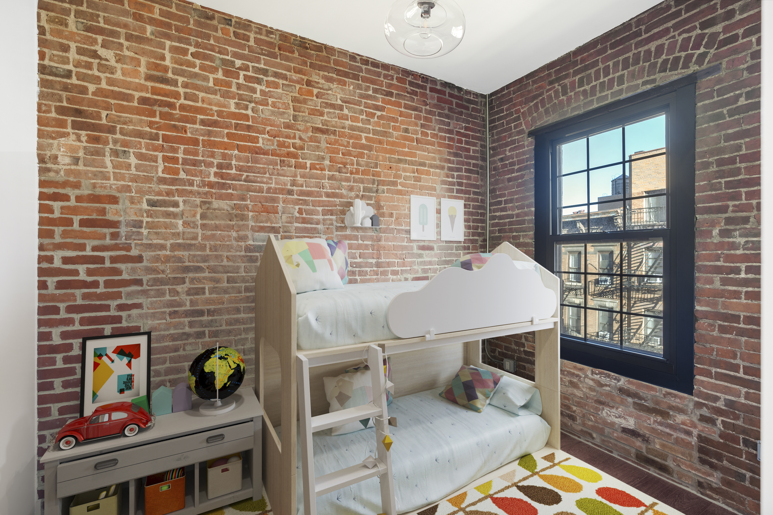 406 West 52nd Street, Unit 2 Manhattan, NY 10019 - Photo 6 of 9 a view of a workspace with furniture