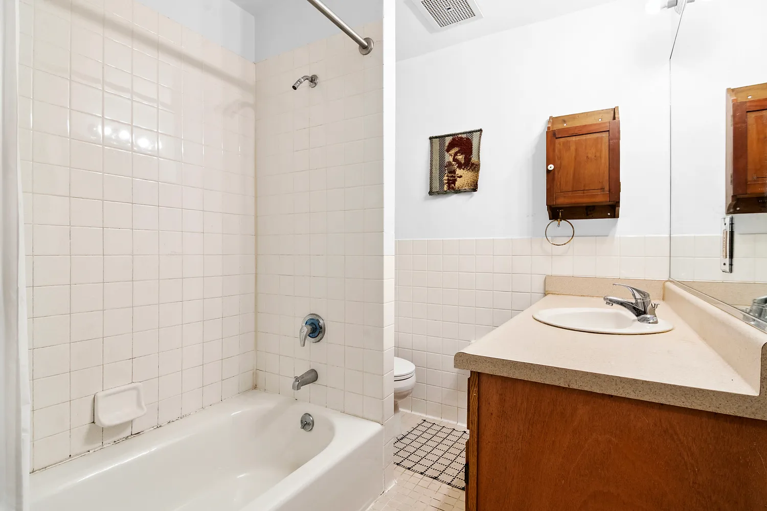 a bathroom with a sink and a bathtub