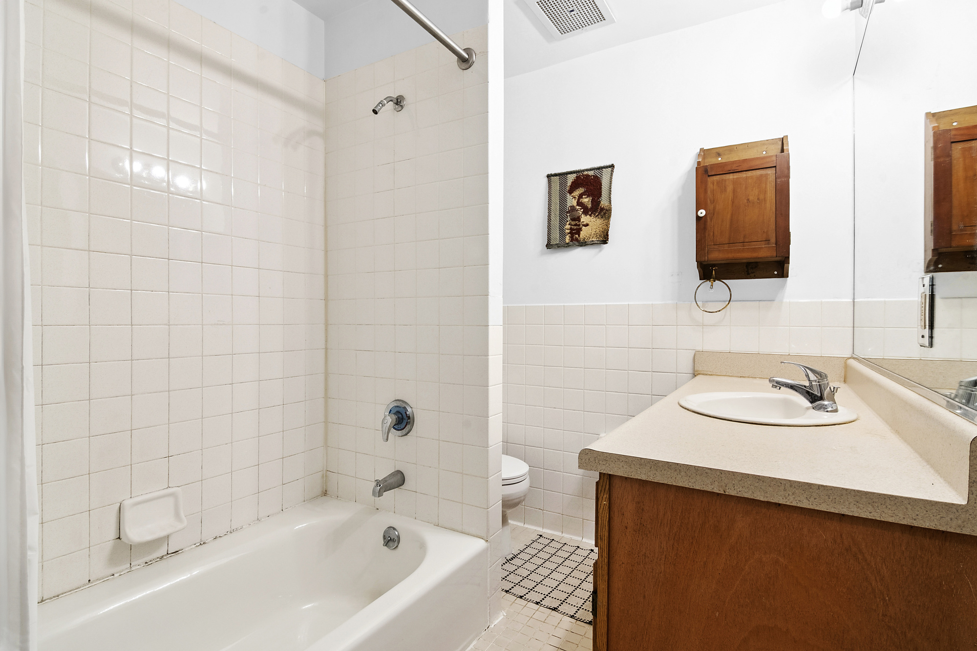 789 A Monroe Street, Unit 2 Brooklyn, NY 11221 - Photo 5 of 8 a bathroom with a sink and a bathtub