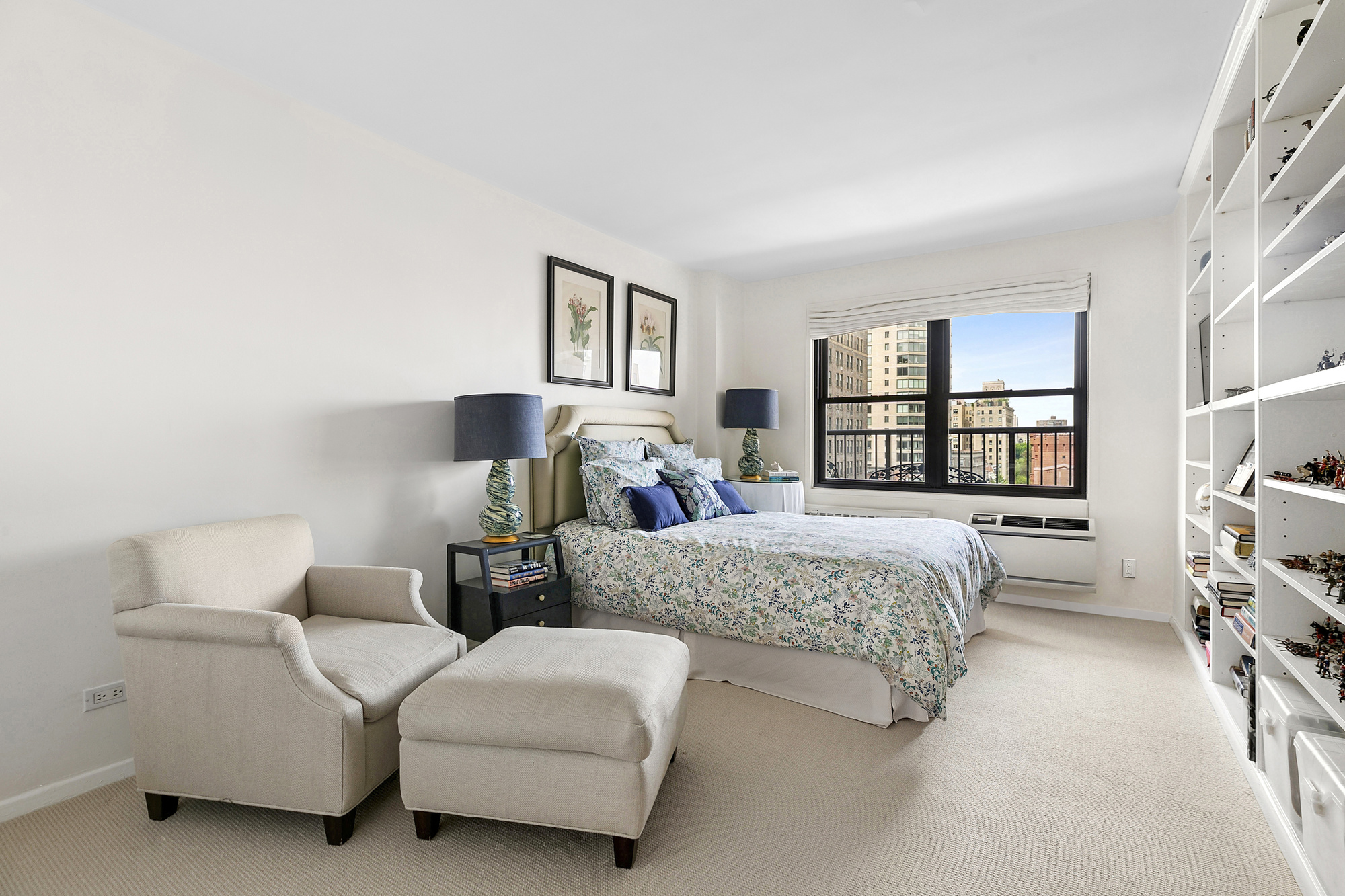 1199 Park Avenue, Unit 10K Manhattan, NY 10128 - Photo 8 of 12 a bedroom with two beds and a book shelf