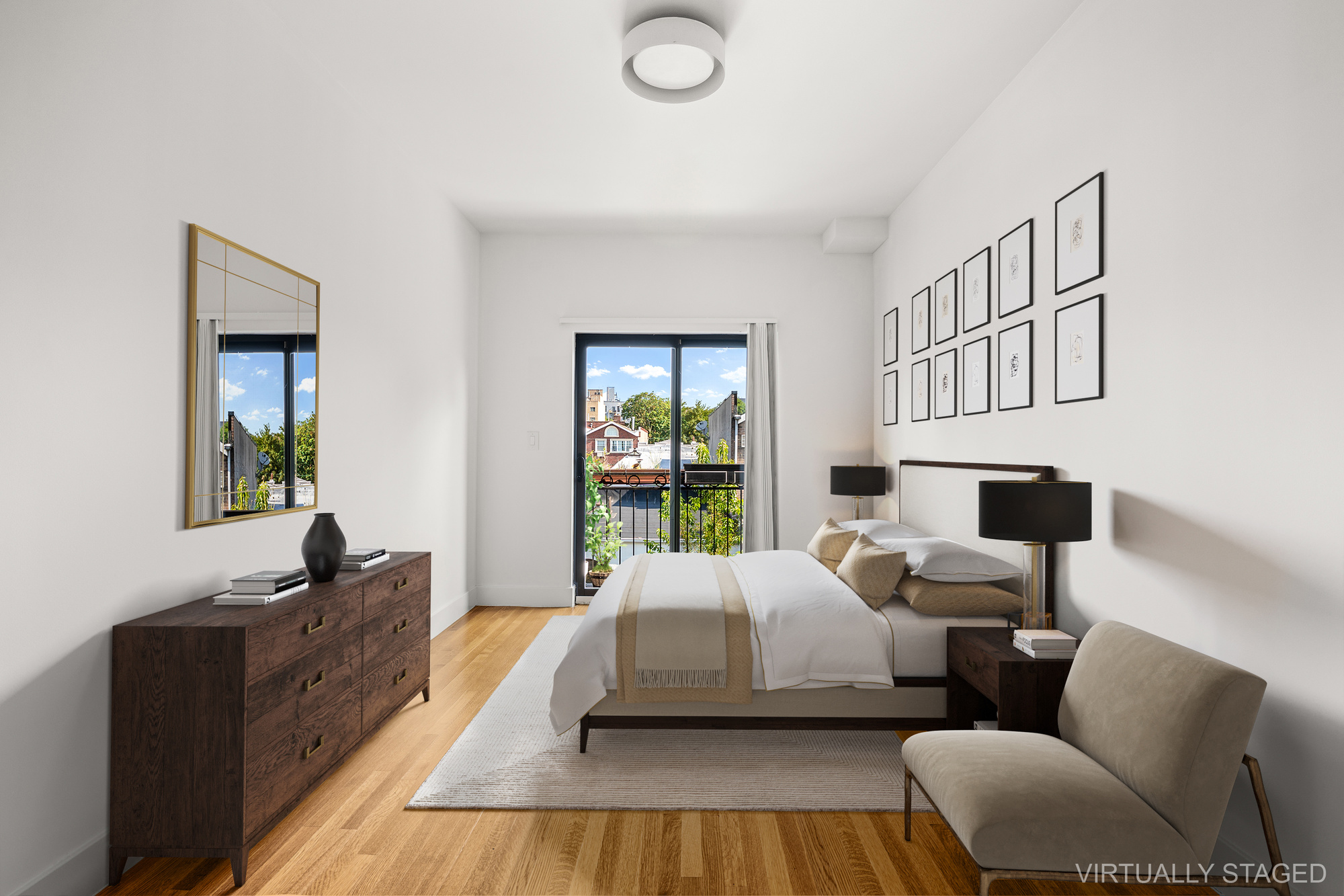 495 Rutland Road, Unit 3 Brooklyn, NY 11203 - Photo 7 of 12 a bedroom with a bed and a couch