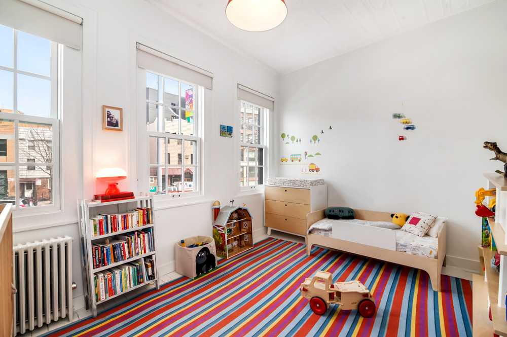 338 Metropolitan Avenue Brooklyn, NY 11211 - Photo 13 of 18 a reading room with furniture and book shelf