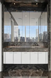 a kitchen with stainless steel appliances granite countertop a sink and a counter