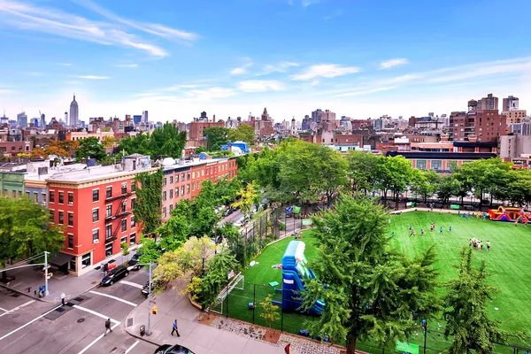 a view of a living room and kitchen