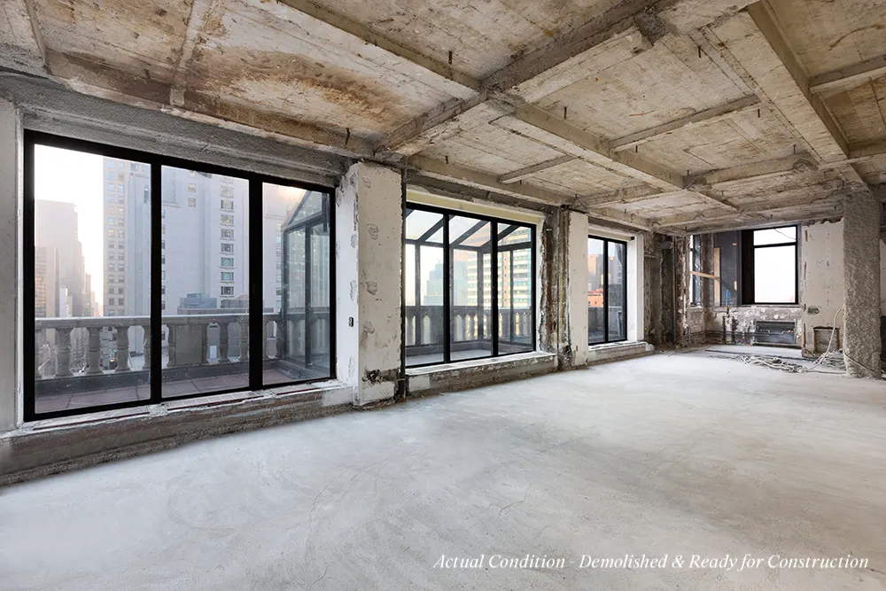 a view of an empty room with a balcony