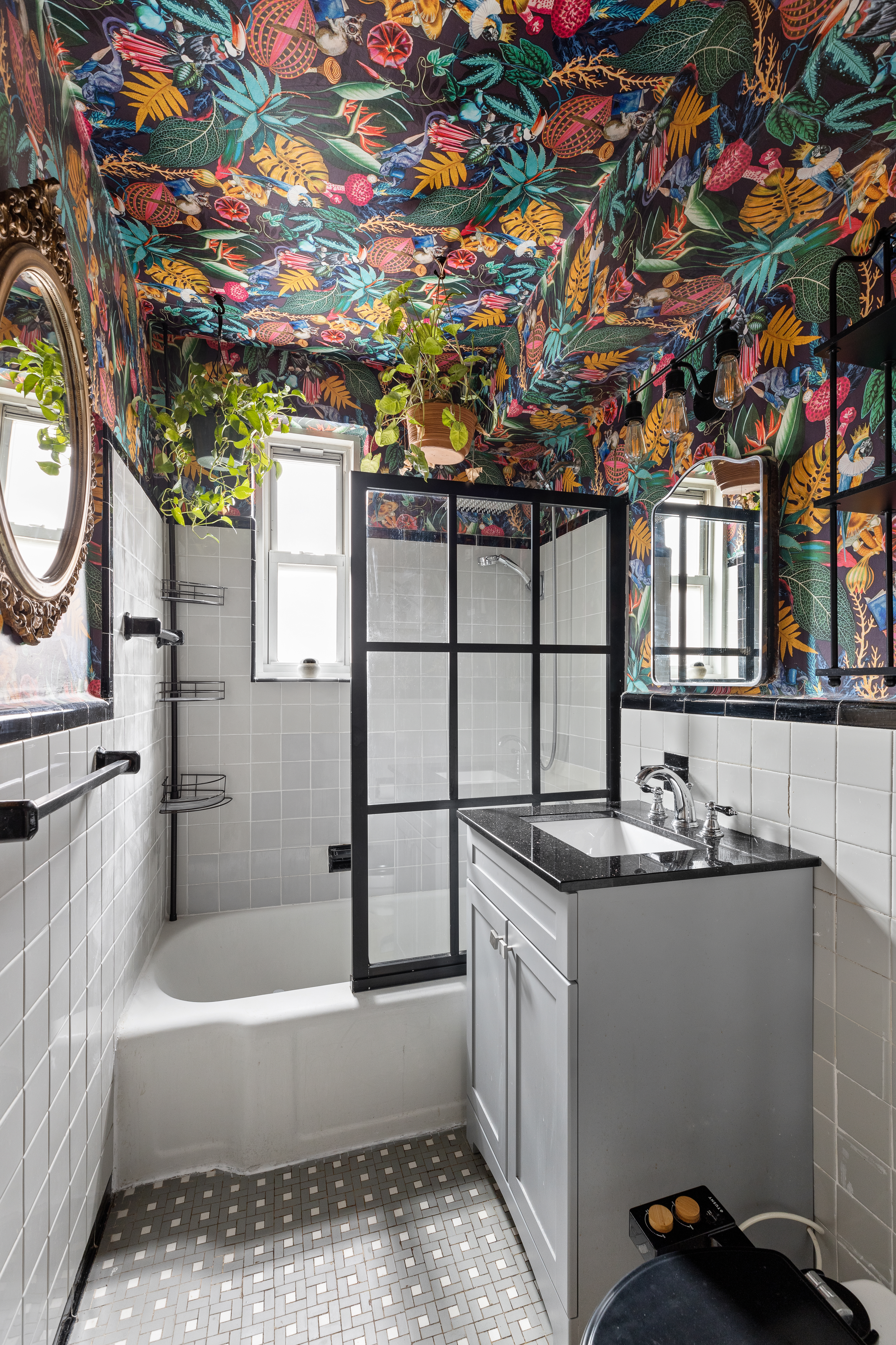 39-50 52nd Street, Unit 3E Queens, NY 11377 - Photo 5 of 7 a bathroom with a sink and a bathtub