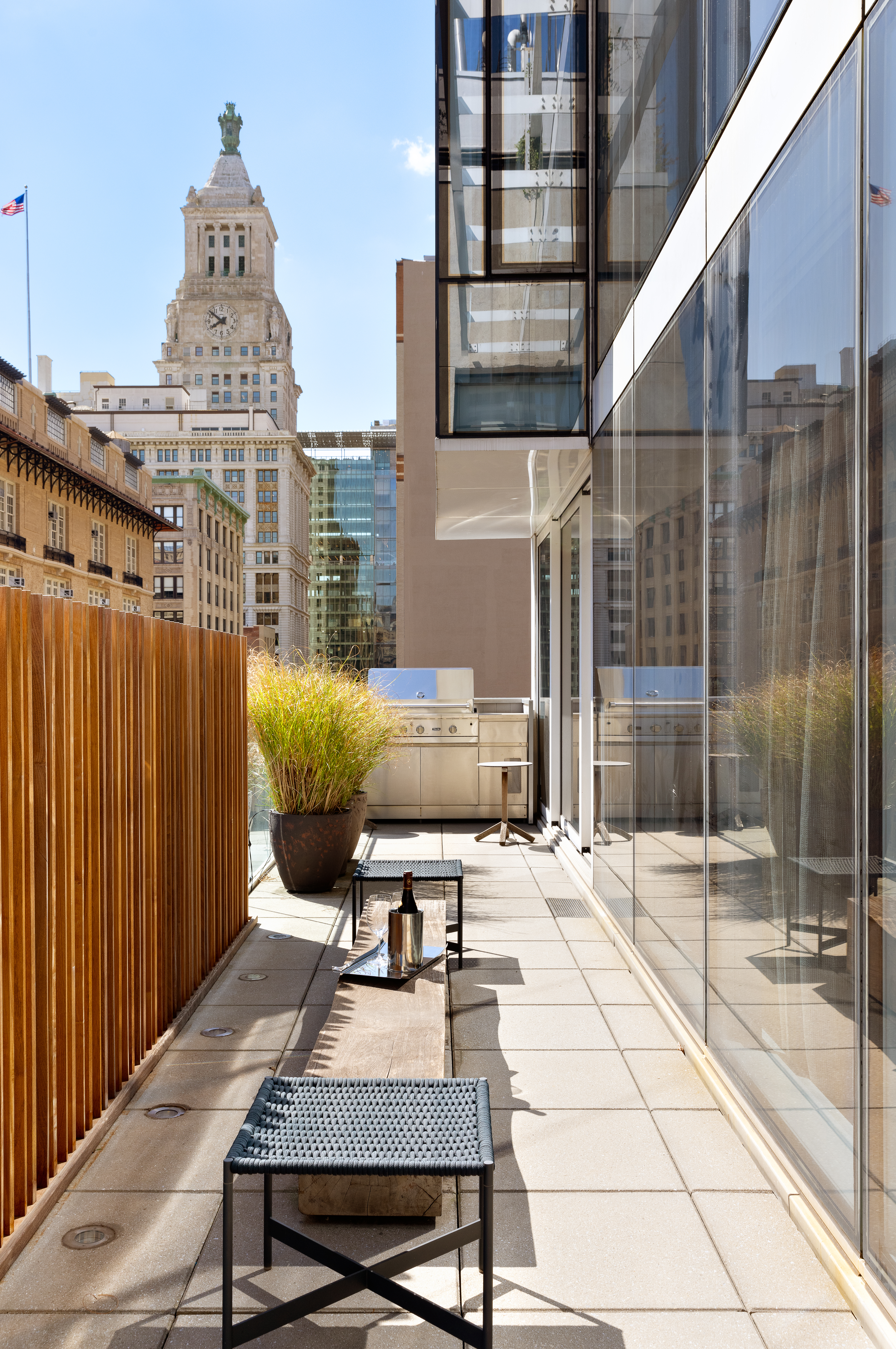 57 Irving Place, Unit PH9/10 Manhattan, NY 10003 - Photo 10 of 33 a roof deck with couch and chairs