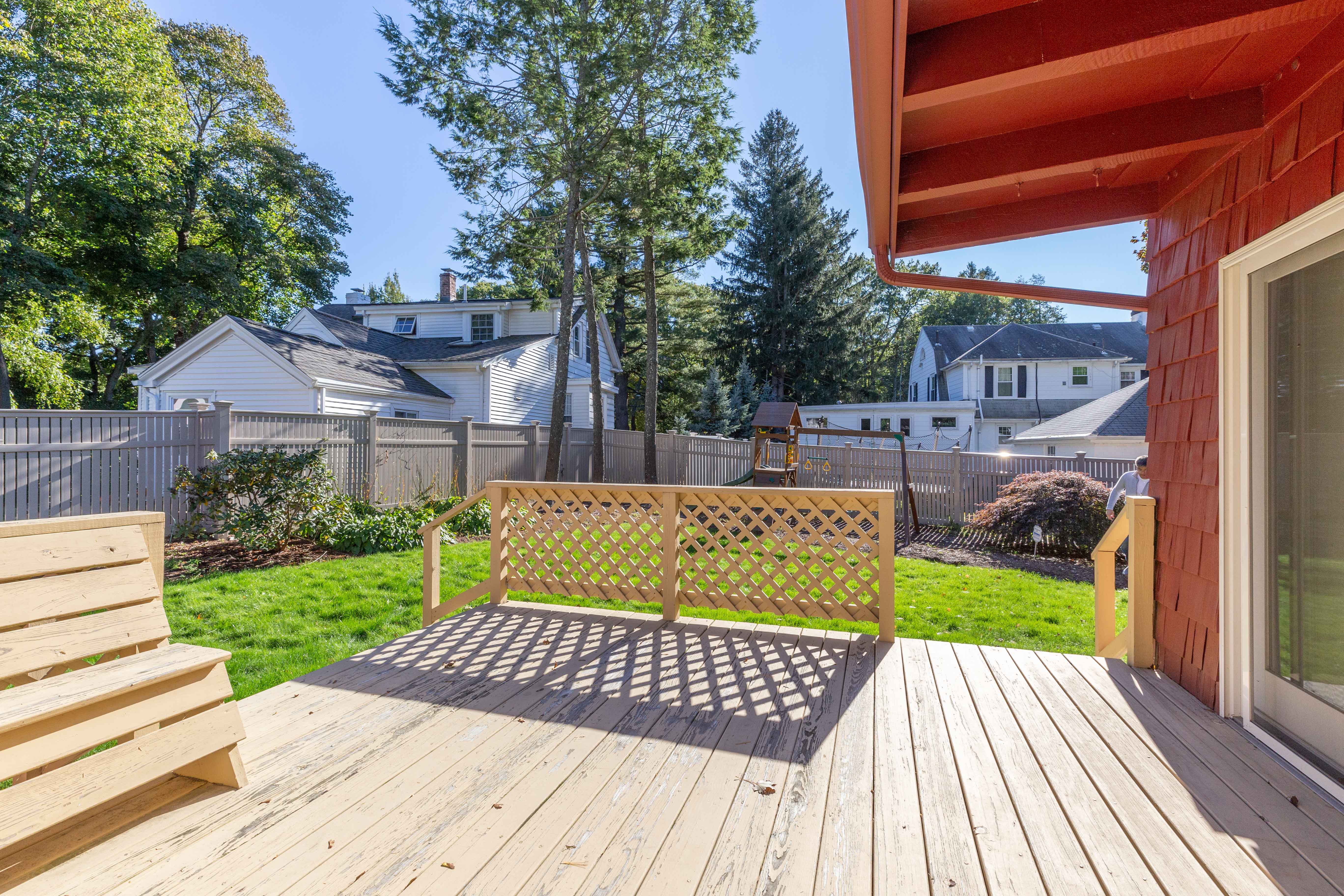 290 Dorset Road Waban, MA 02468 - Photo 11 of 23 a view of a backyard with couches plants and large tree