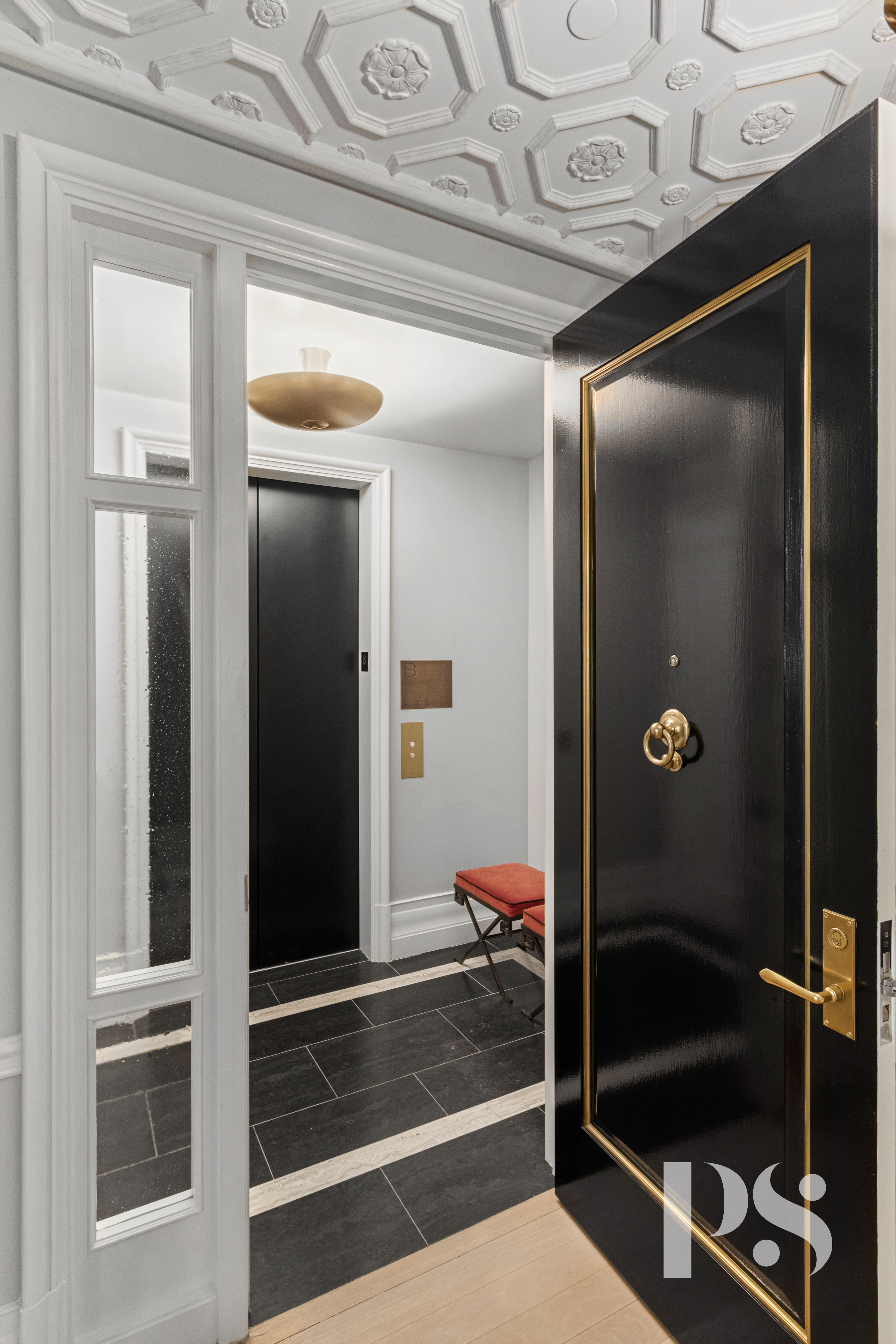 135 East 79th Street, Unit 8E Manhattan, NY 10075 - Photo 24 of 26 a bathroom with a mirror and a shower