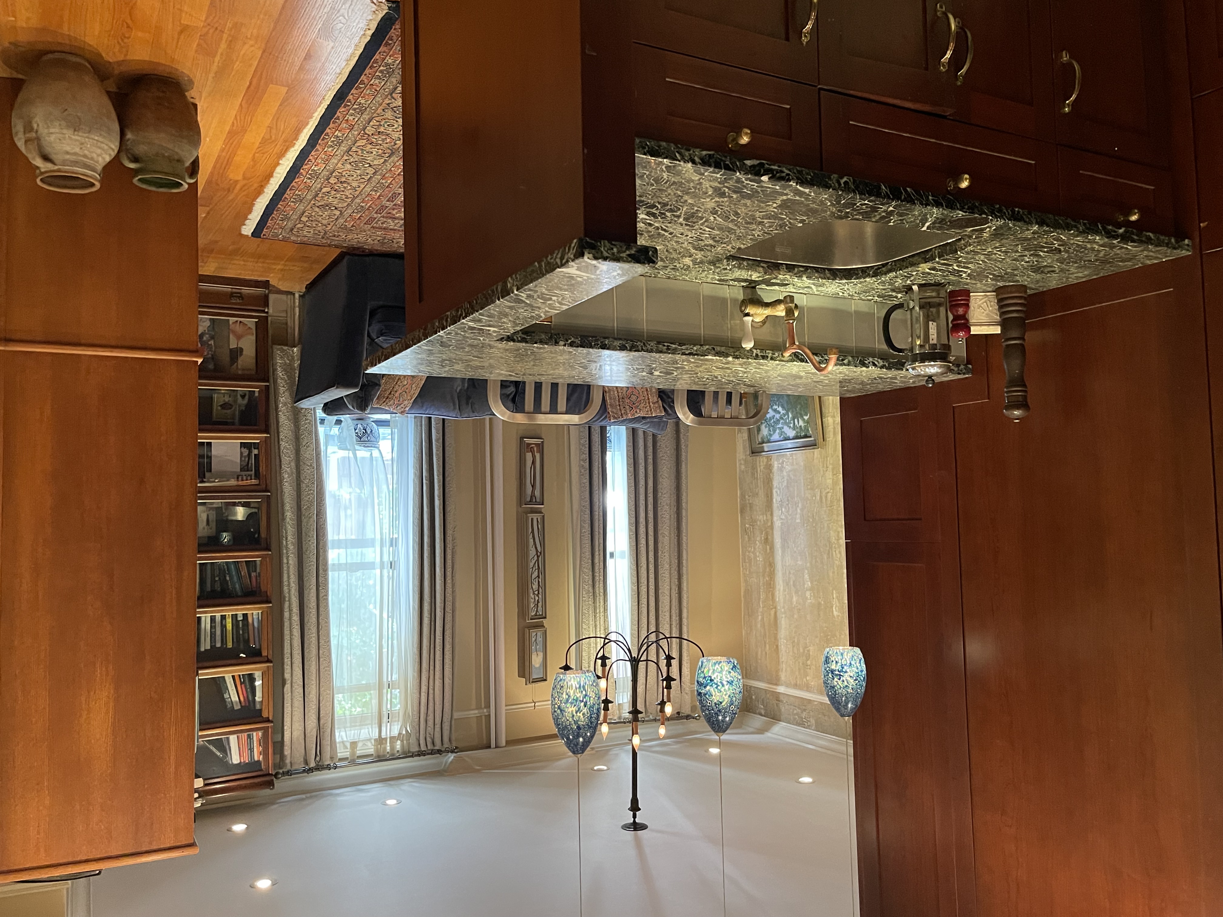 96 Perry Street, Unit B3 Manhattan, NY 10014 - Photo 7 of 16 a bathroom with a granite countertop sink and a large mirror
