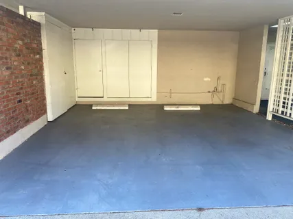 an empty room with an empty space and a window