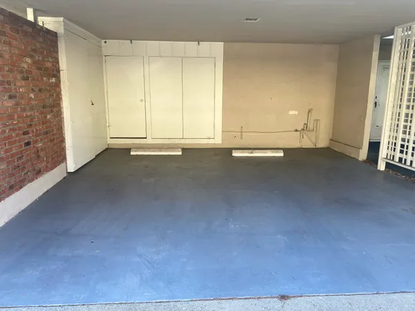 an empty room with an empty space and a window