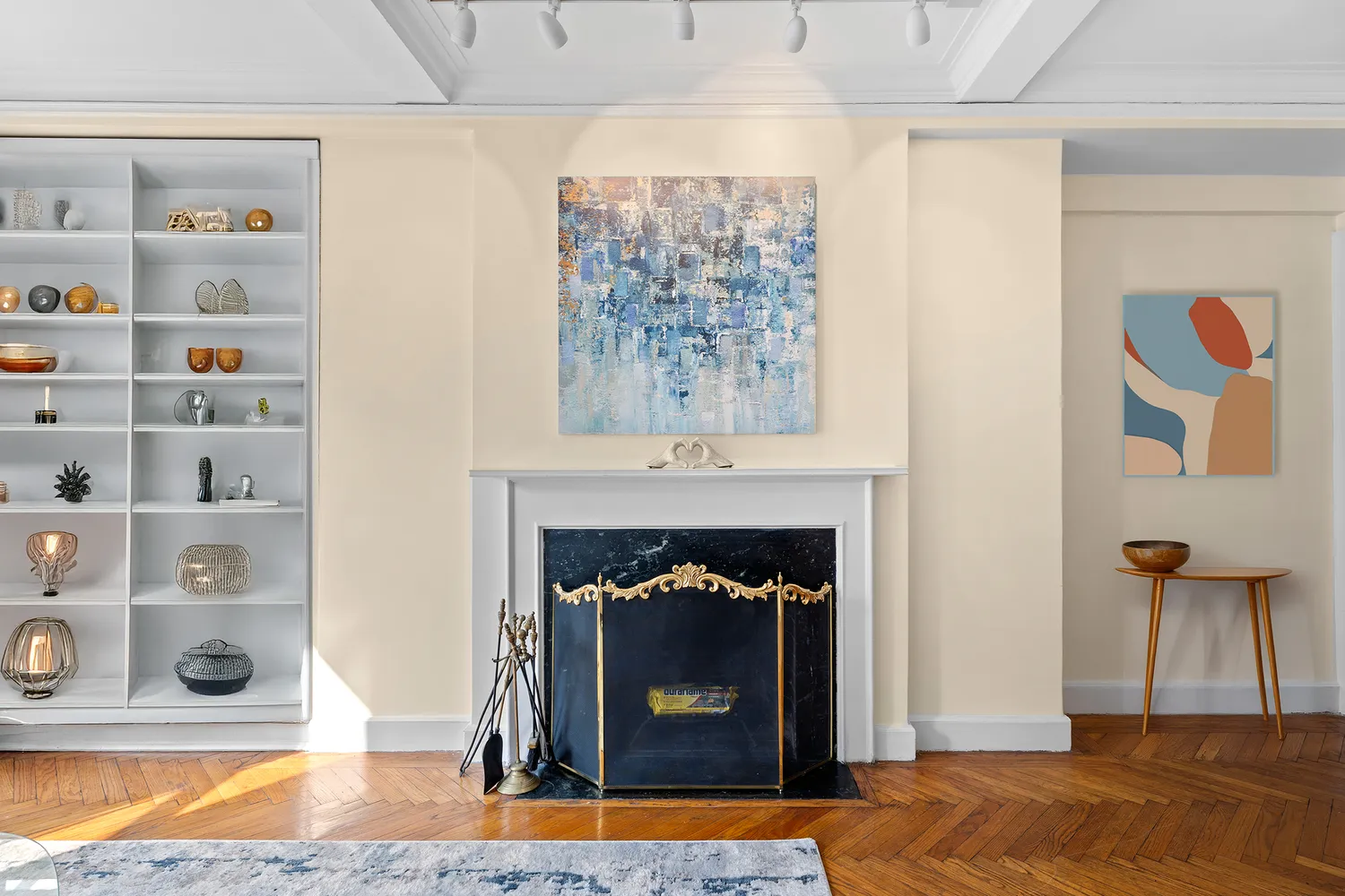 a living room with a fireplace furniture and a window