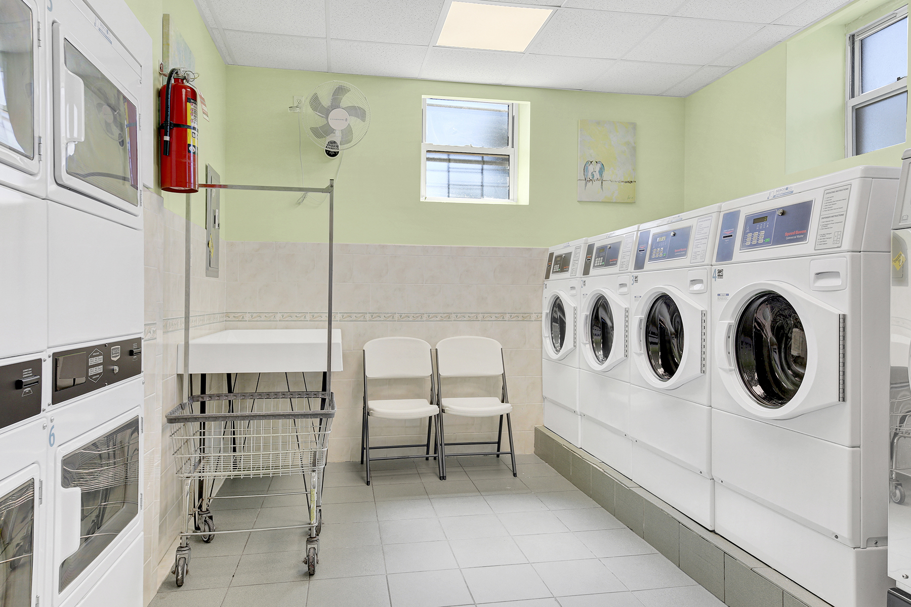 125 Beach 124th Street, Unit 5K Queens, NY 11694 - Photo 18 of 21 a utility room with dryer and washer