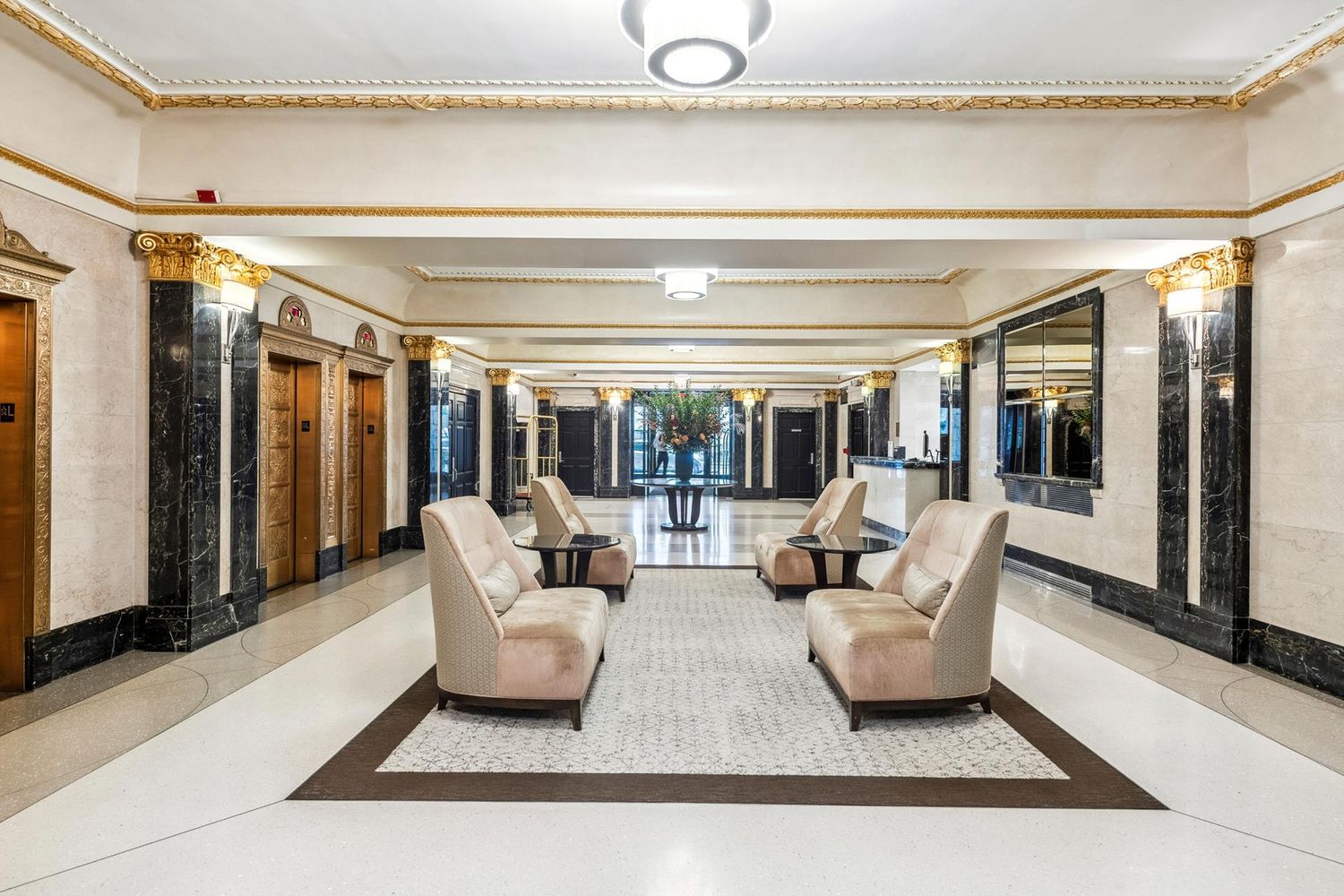 27 West 72nd Street, Unit 1403 Manhattan, NY 10023 - Photo 10 of 16 a living room with furniture