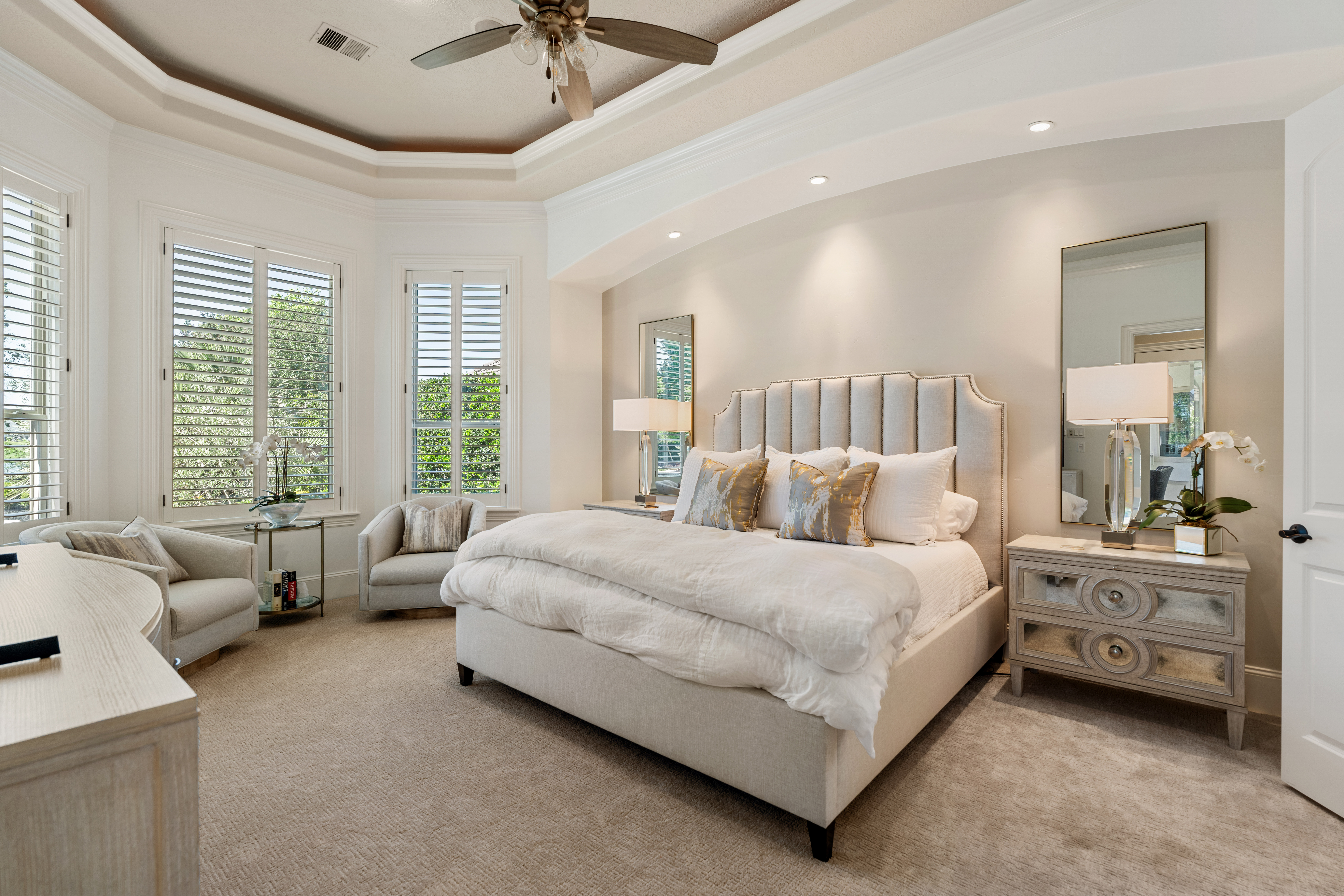 82 Manor Lake Estates Circle Spring, TX 77379 - Photo 23 of 52 a spacious bedroom with a bed and a couch