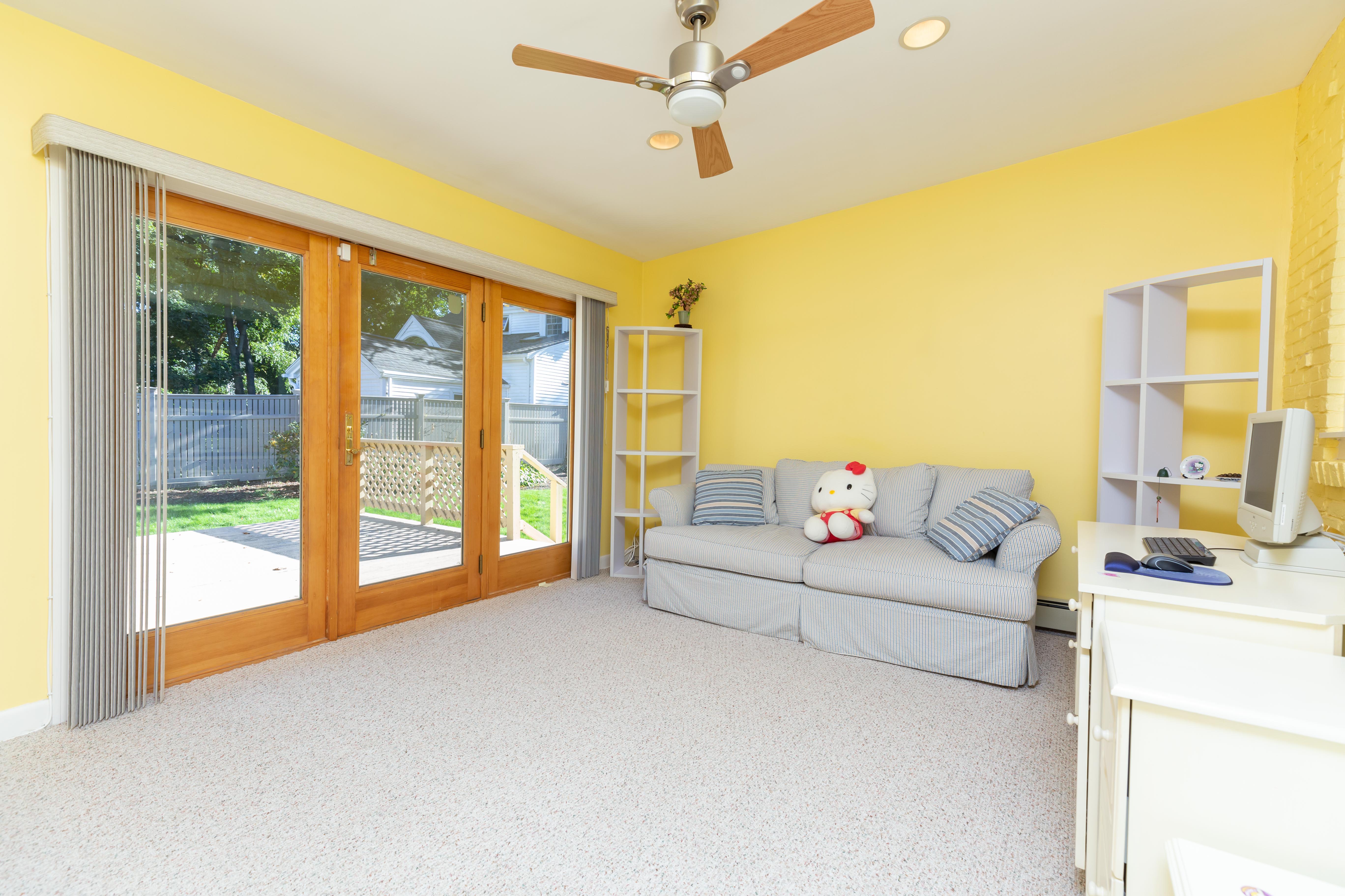 290 Dorset Road Waban, MA 02468 - Photo 9 of 23 a living room with furniture and a large window