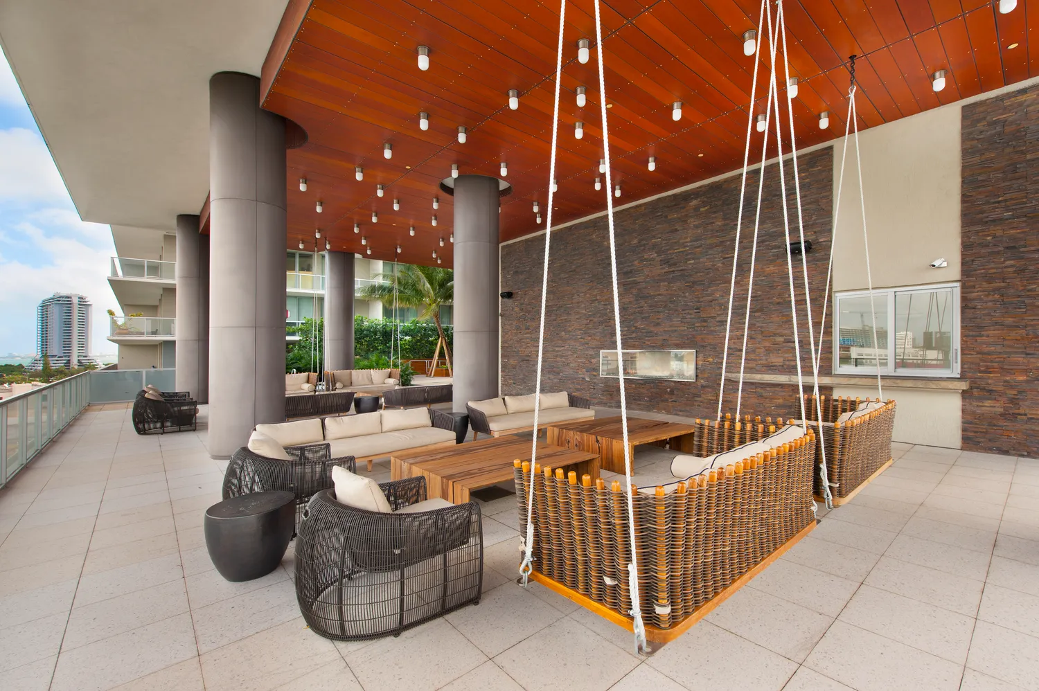 a outdoor space with patio furniture and a potted plant