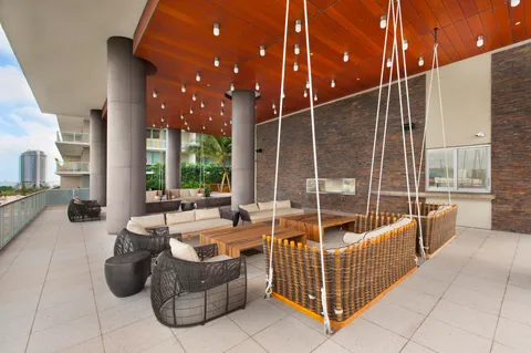 a outdoor space with patio furniture and a potted plant