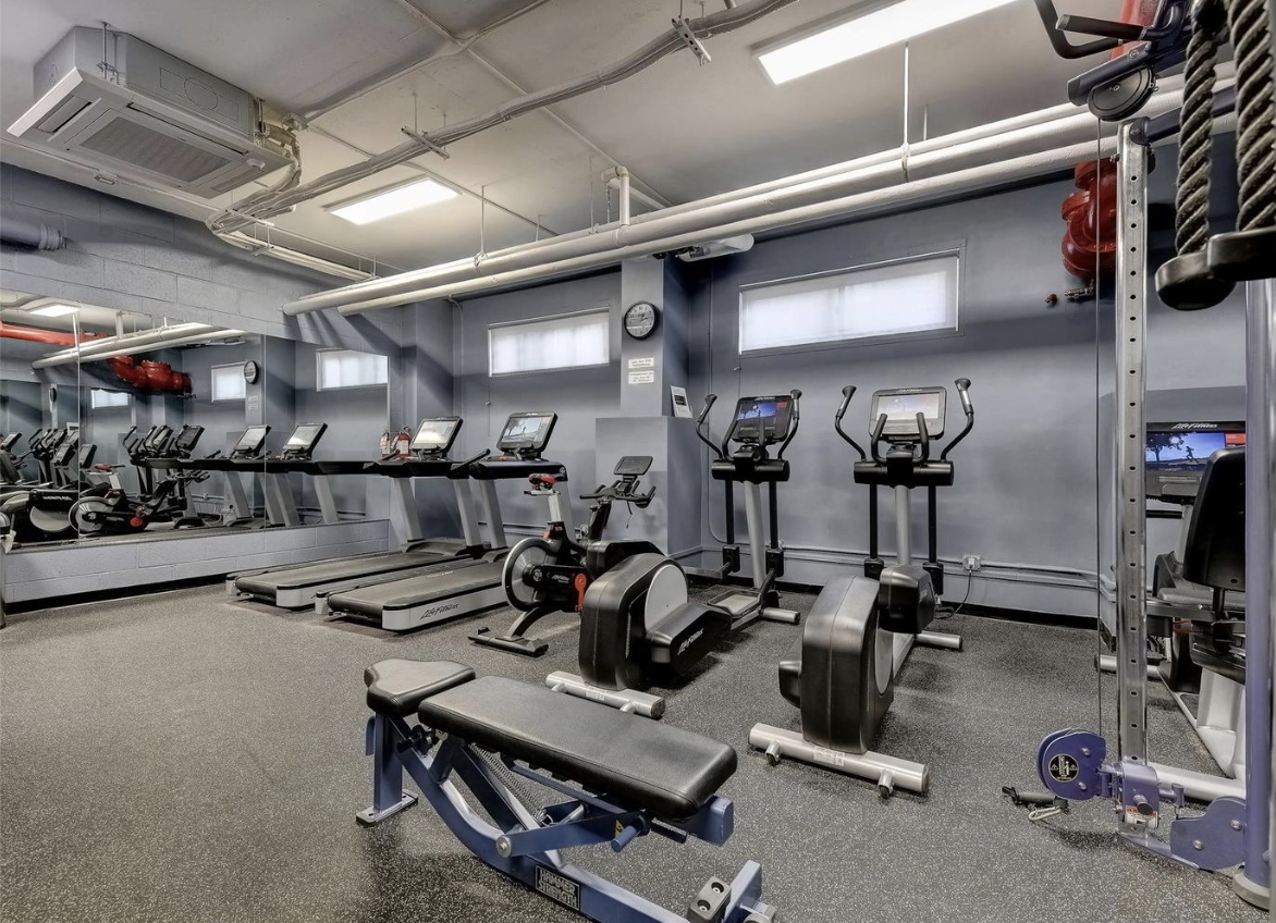 303 West 66th Street, Unit 6BW Manhattan, NY 10023 - Photo 10 of 12 a view of a room with gym equipment