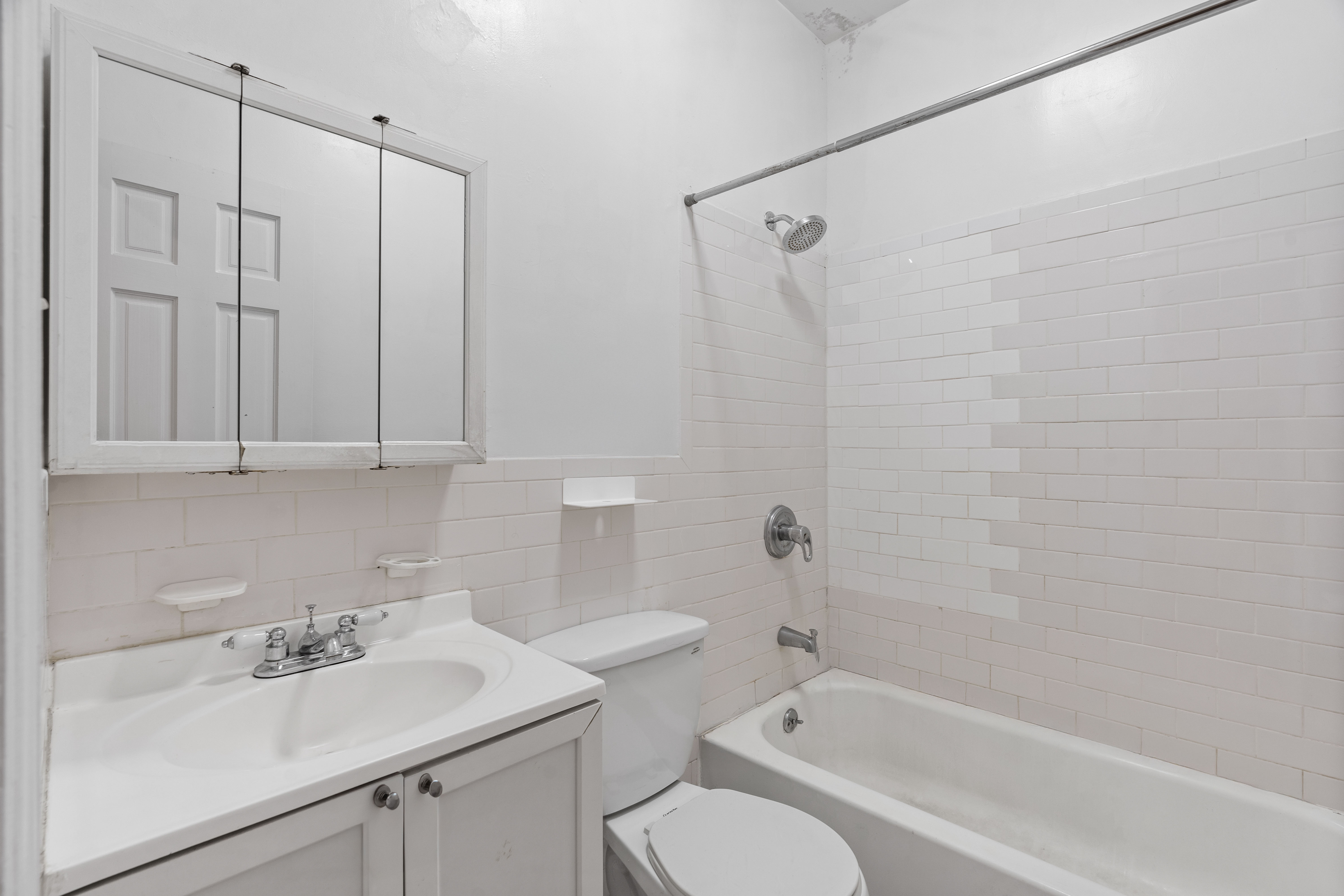31 St Marks Place, Unit 1 Manhattan, NY 10003 - Photo 8 of 11 a bathroom with a sink toilet and shower