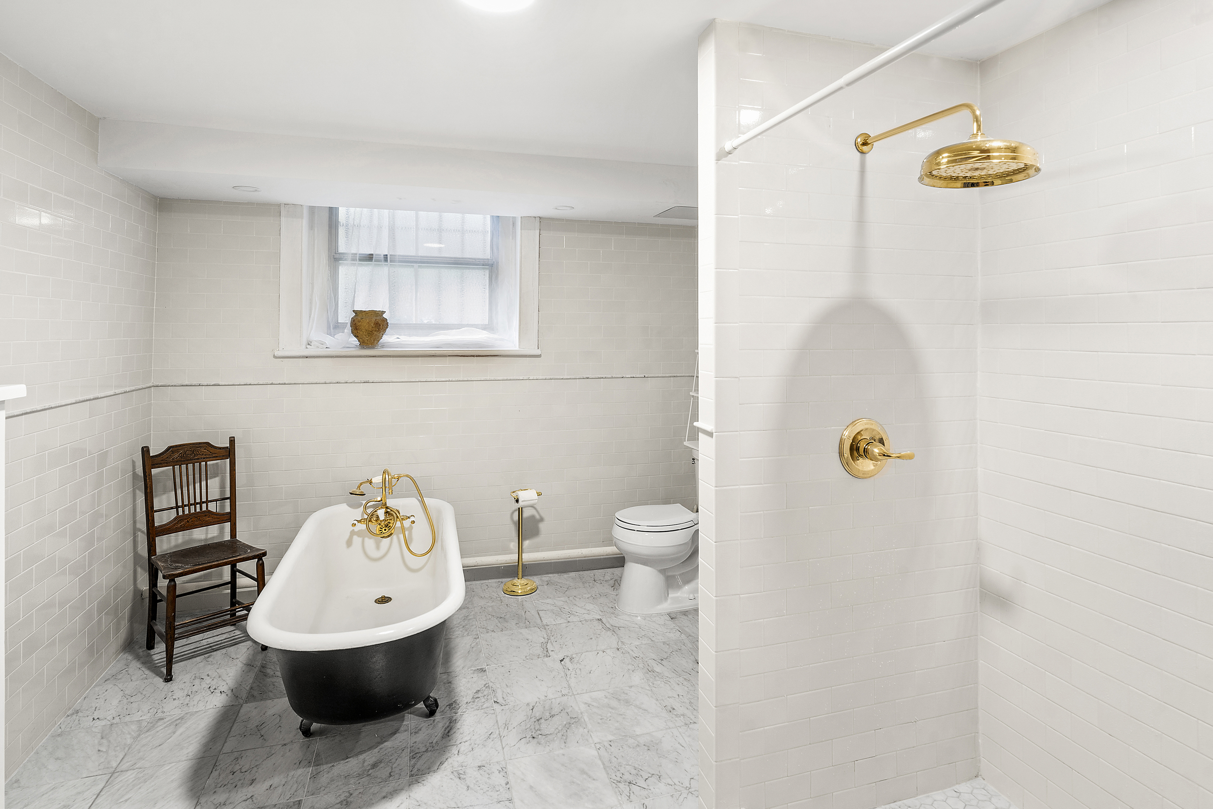 419 Clinton Avenue Brooklyn, NY 11238 - Photo 9 of 19 a bathroom with a sink and a toilet