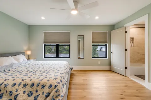a bedroom with a bed and a walk in closet