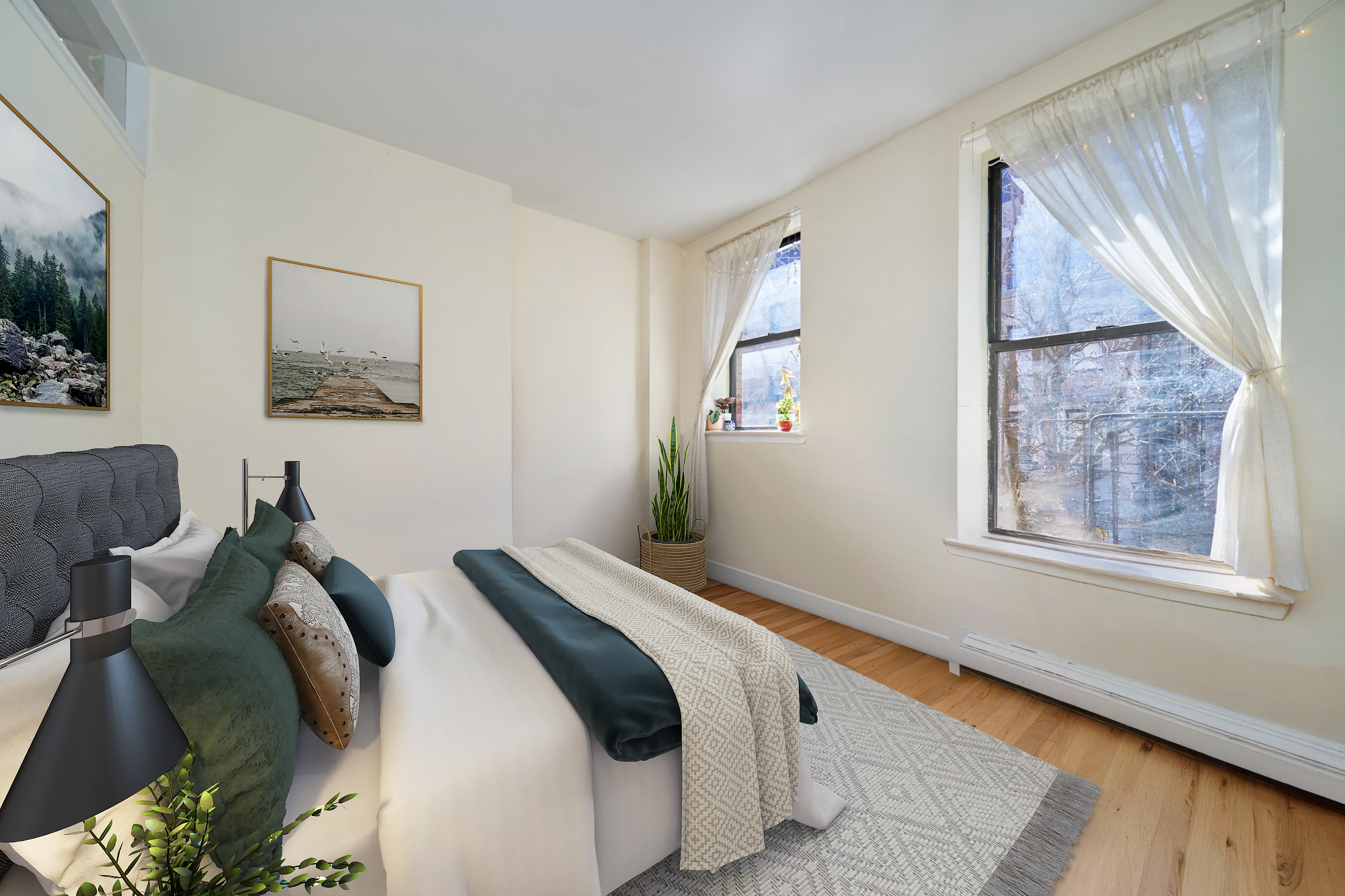 105 West 105th Street, Unit 3B Manhattan, NY 10025 - Photo 2 of 4 a bedroom with furniture and a window