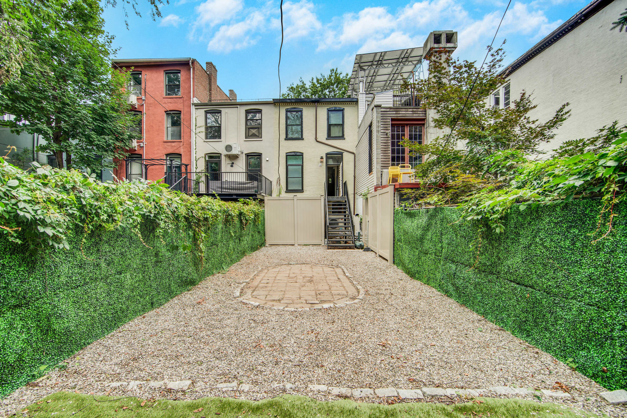 42 Monroe Street, Unit 2 Brooklyn, NY 11238 - Photo 13 of 19 a front view of a house with a yard