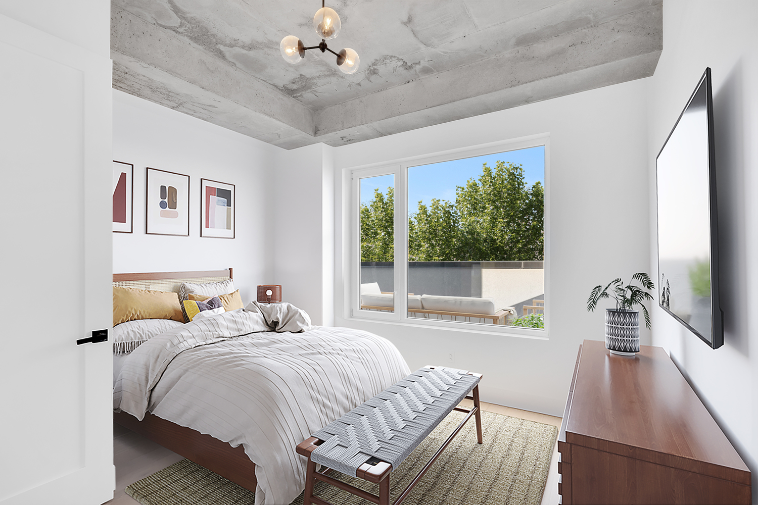 228 Vanderbilt Avenue, Unit 4A Brooklyn, NY 11205 - Photo 8 of 14 a bedroom with a large bed and a large window