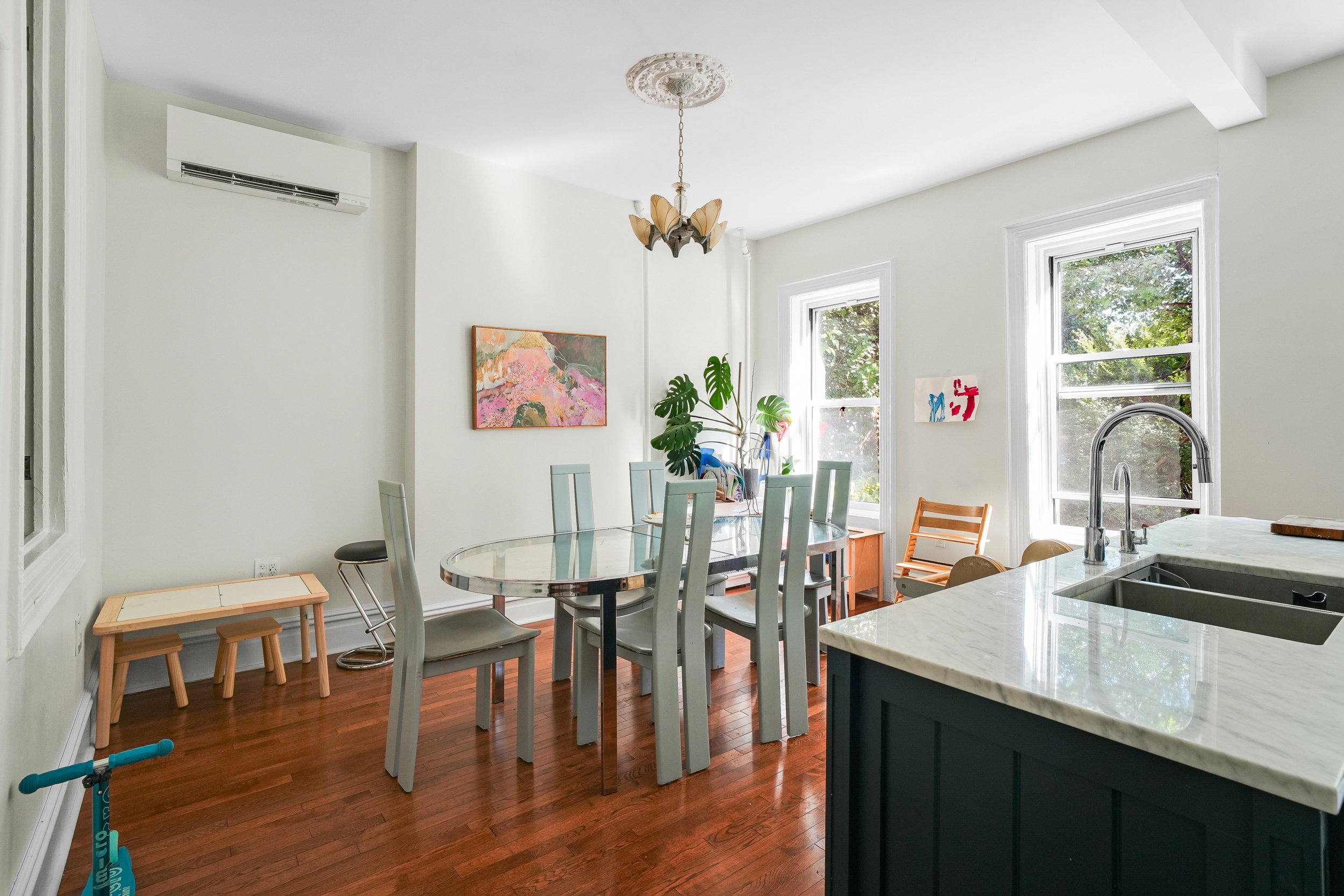 252 Jackson Street Brooklyn, NY 11211 - Photo 7 of 16 a view of a dining room with furniture window and wooden floor
