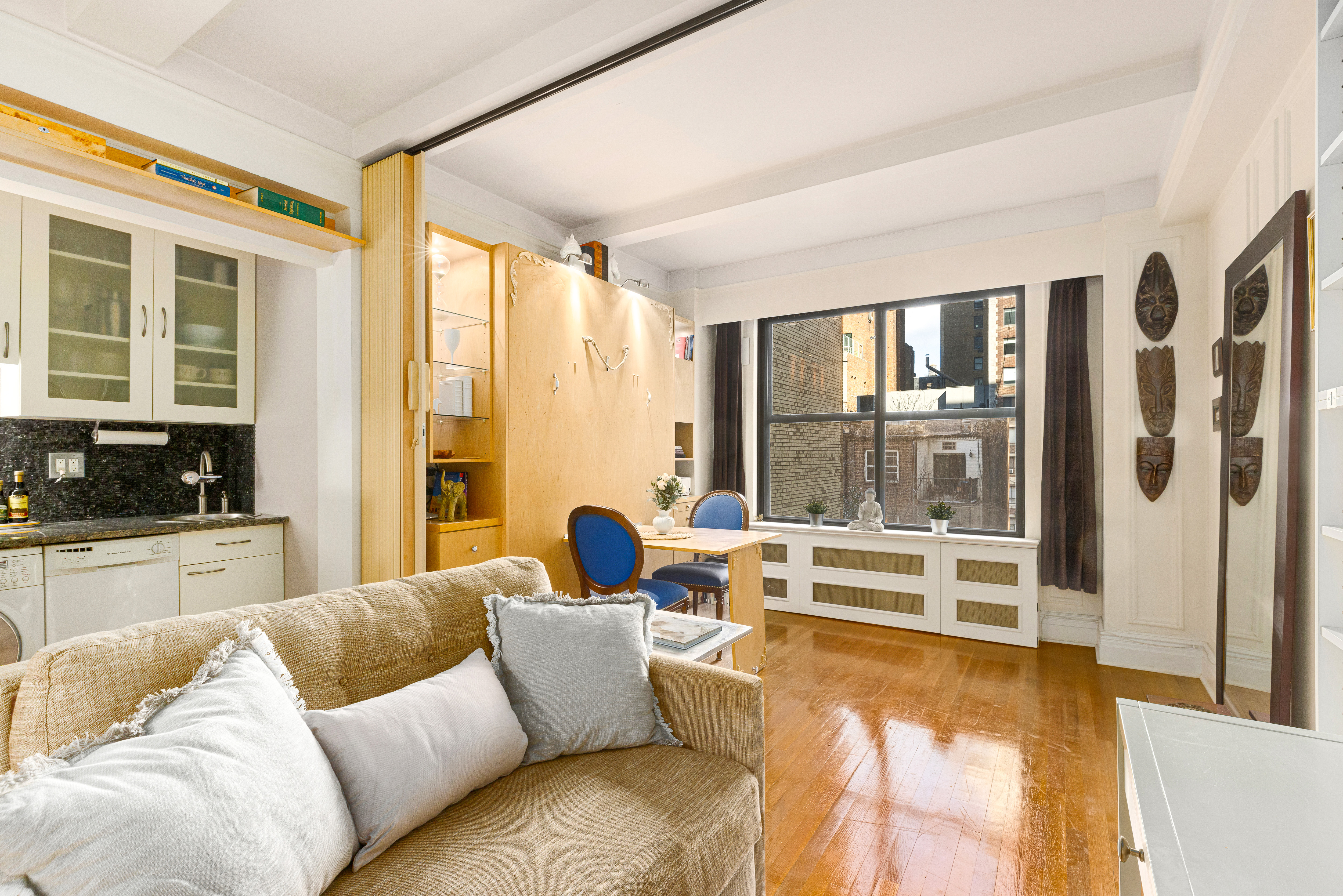 225 Central Park West, Unit 416 Manhattan, NY 10024 - Photo 2 of 16 a living room with furniture and large windows