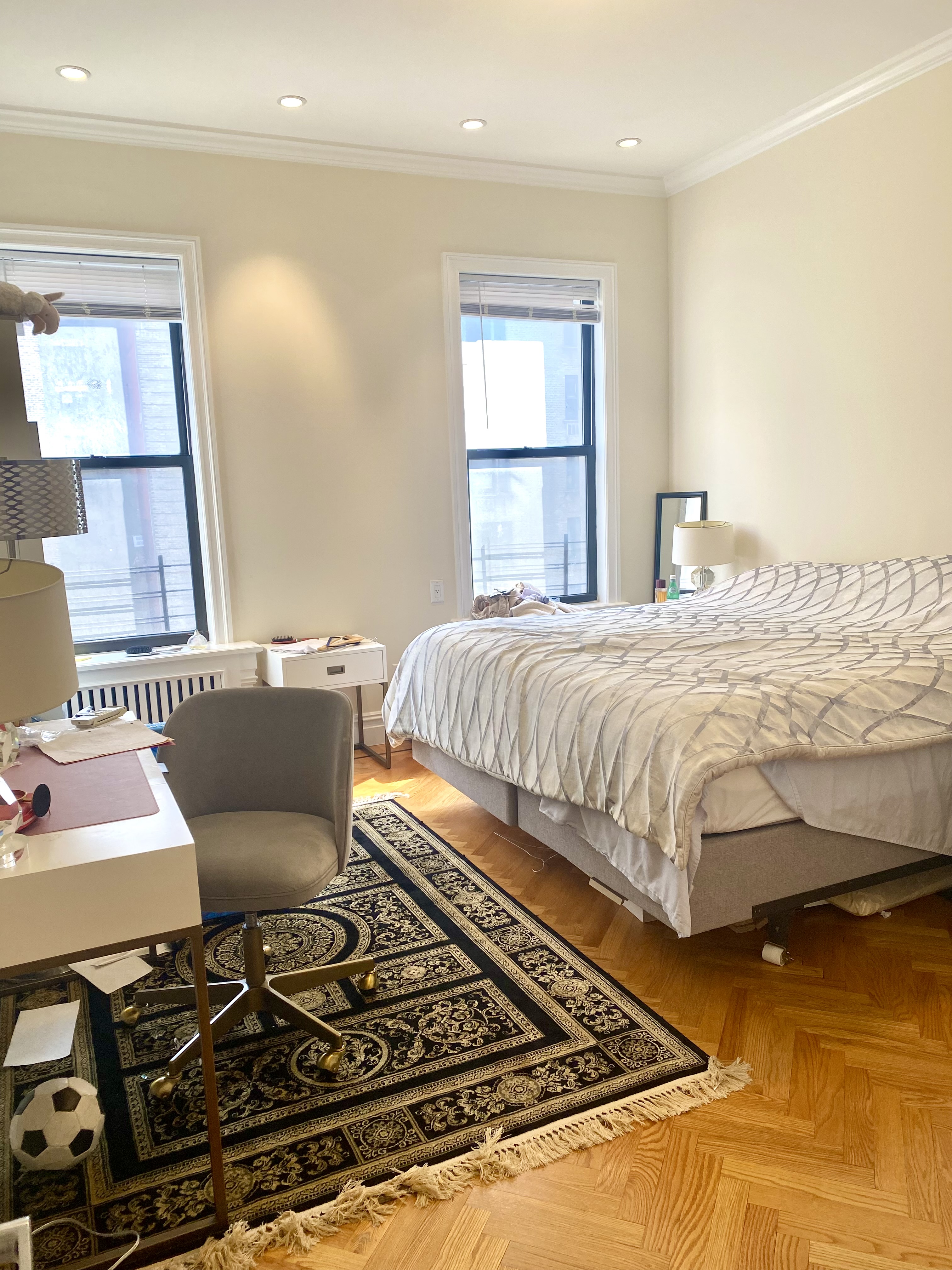 1240 Park Avenue, Unit 6B Manhattan, NY 10128 - Photo 6 of 13 a bed sitting in a bedroom next to a window