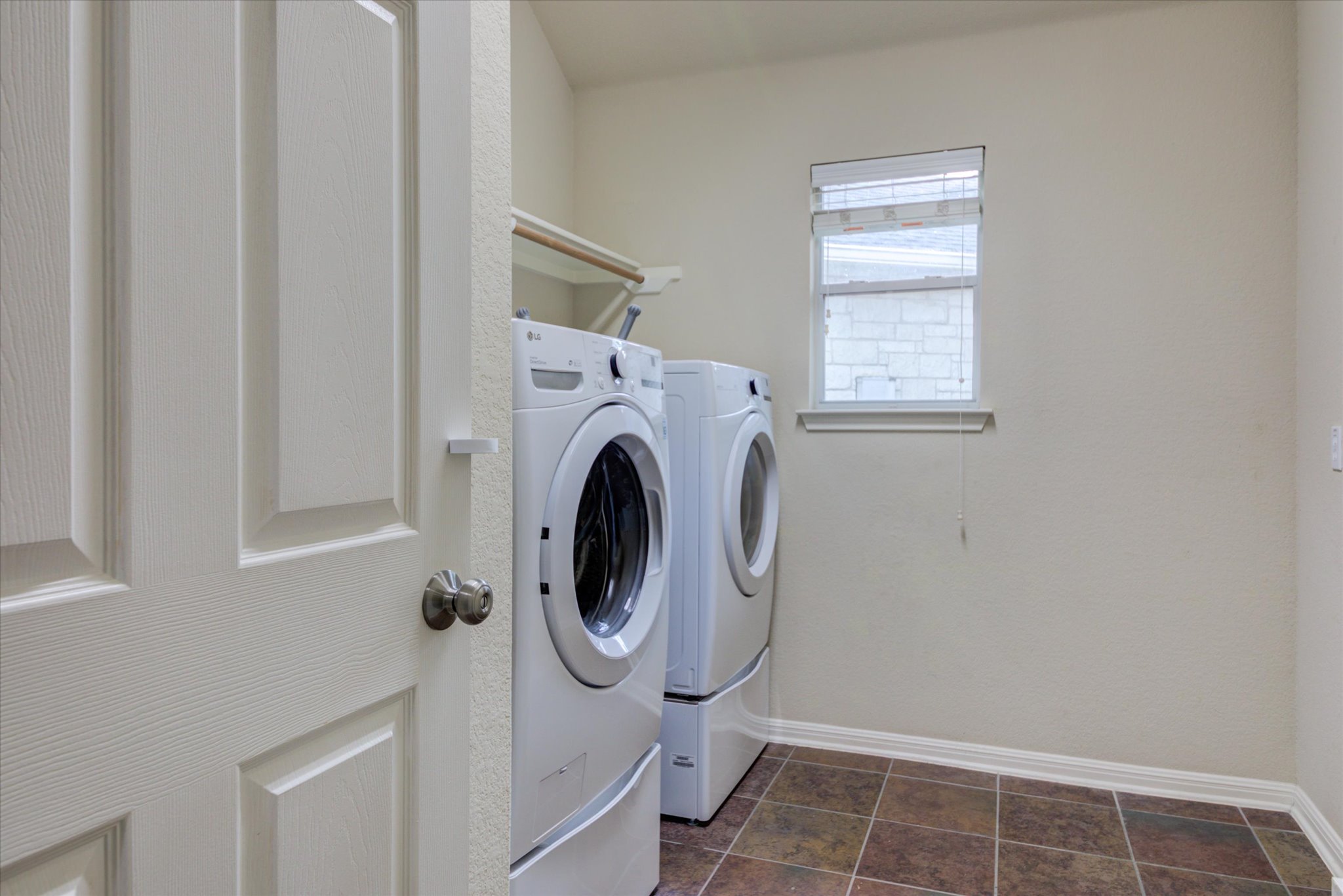 5412 Batak Lane Austin, TX 78749 - Photo 22 of 40 a utility room with dryer and washer