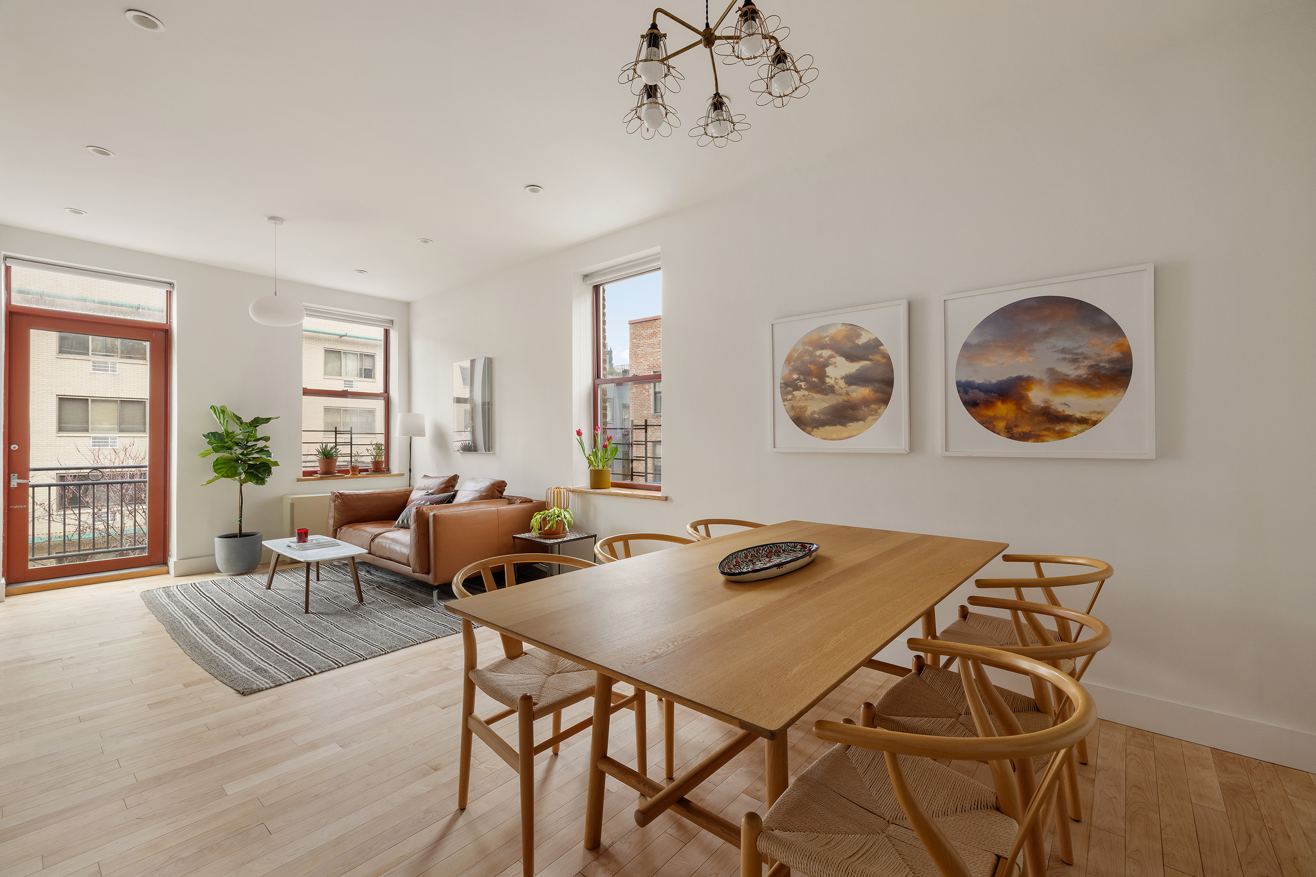 60 Tiffany Place, Unit 3G Brooklyn, NY 11231 - Photo 2 of 10 a living room with furniture and wooden floor