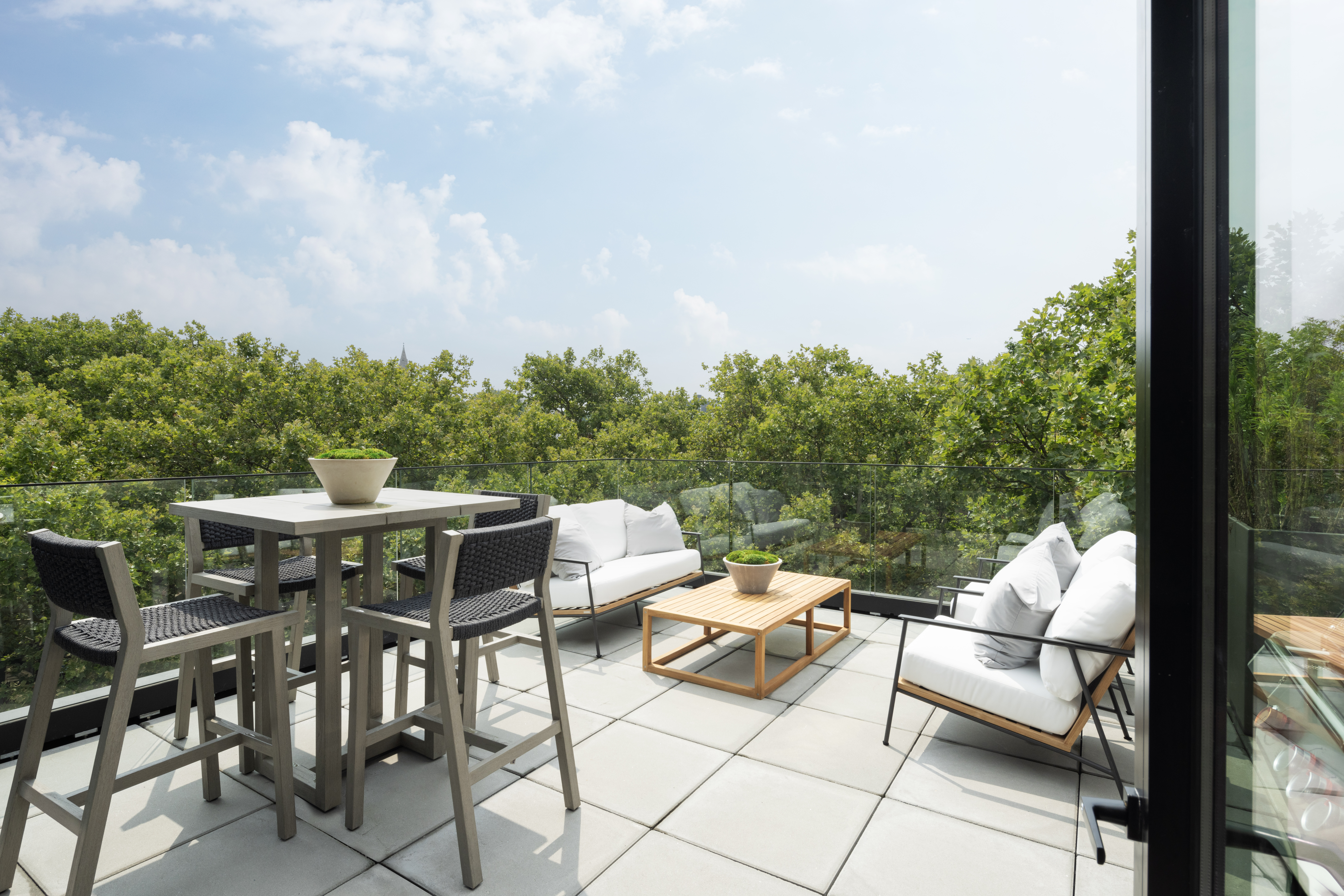 435 Tompkins Avenue, Unit PH505 Brooklyn, NY 11216 - Photo 6 of 14 a view of a patio with furniture