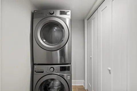 a picture of a bench in front of a wall