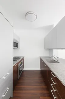 a kitchen with a stove and a sink